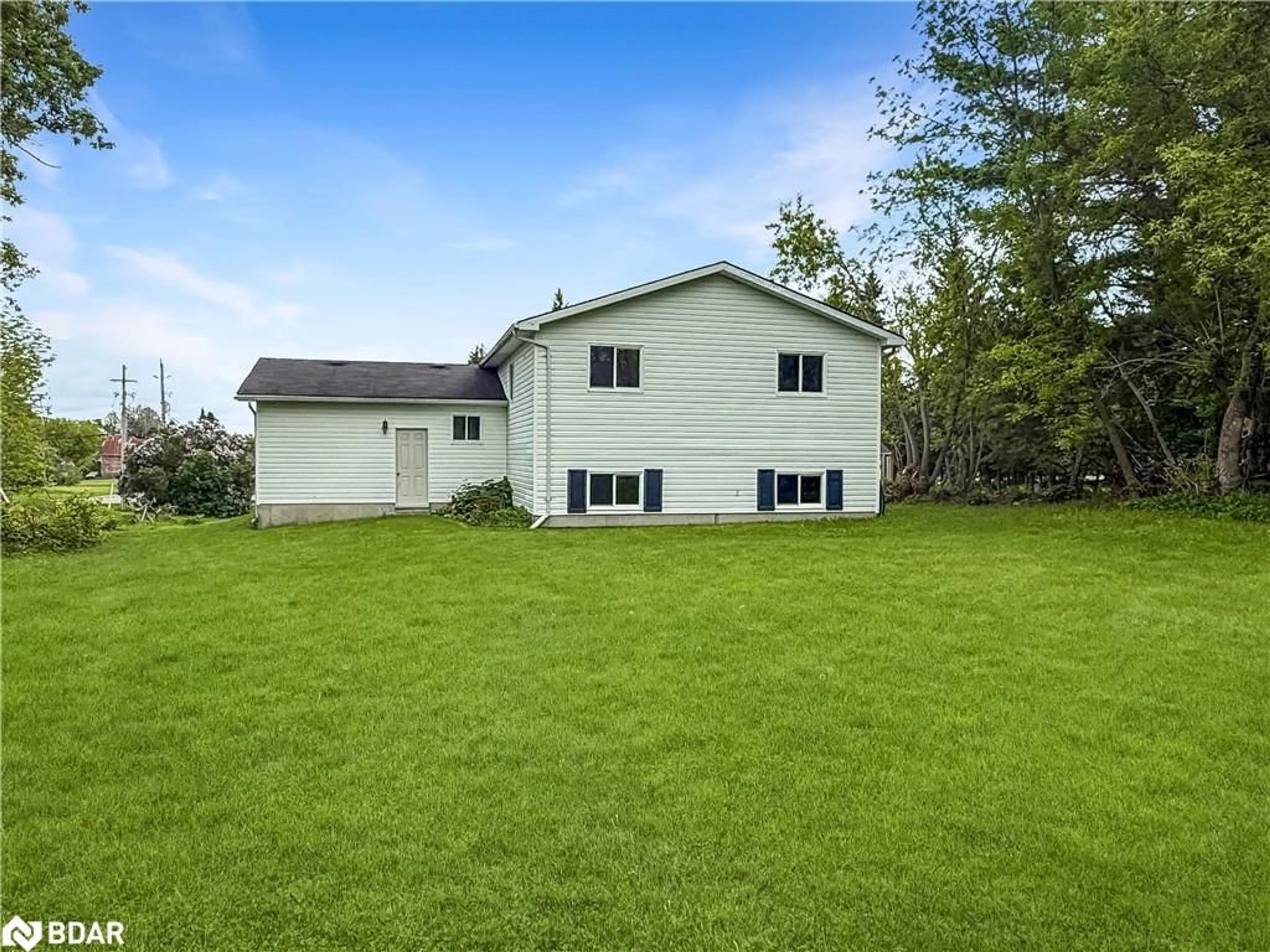 A pic from outside/outdoor area/front of a property/back of a property/a pic from drone, unknown for 691 Addington Street, Tamworth Ontario K0K 3G0
