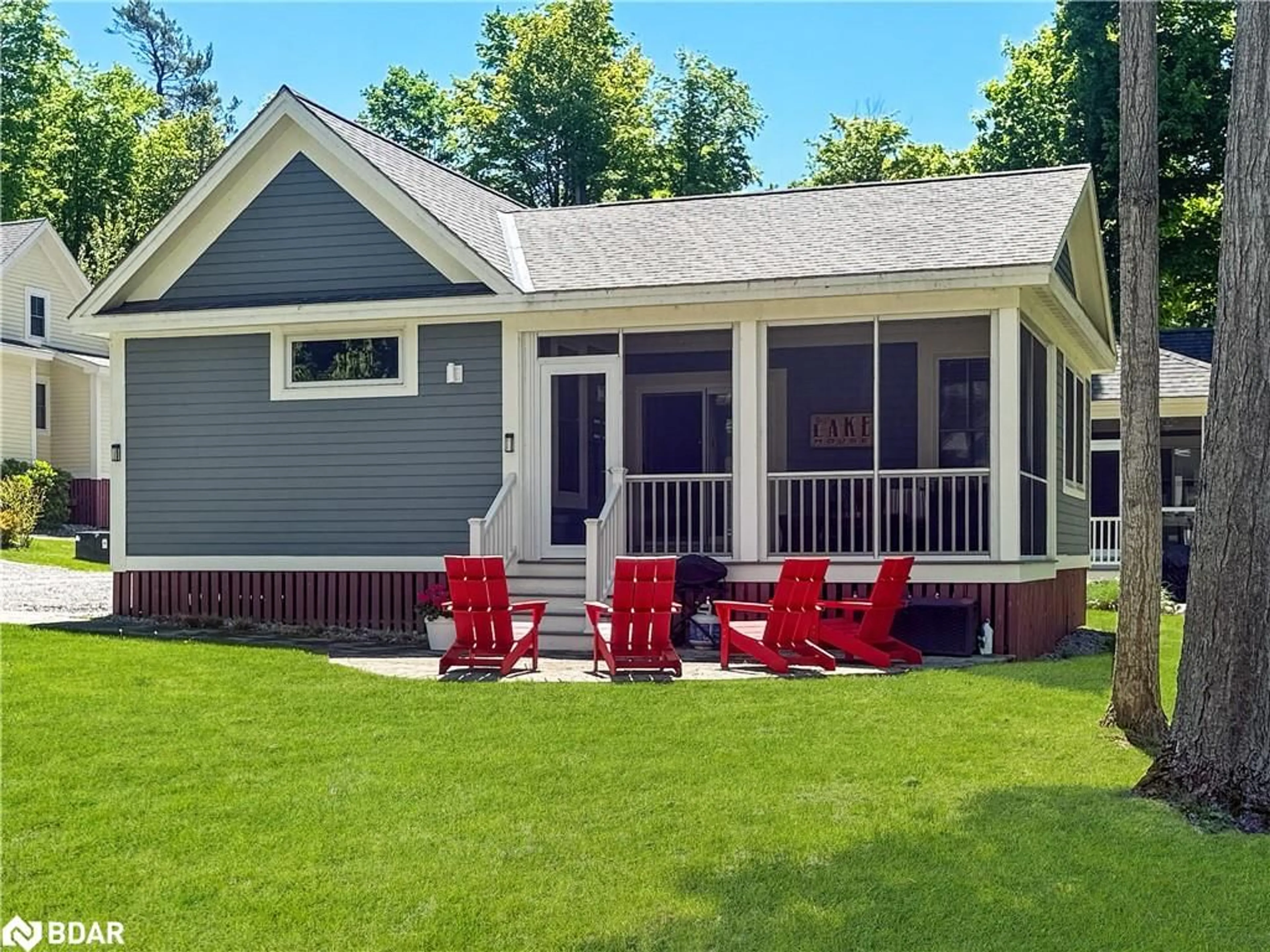 Home with vinyl exterior material, street for 5 Hollow Lane #215, Athol Ontario K0K 1P0