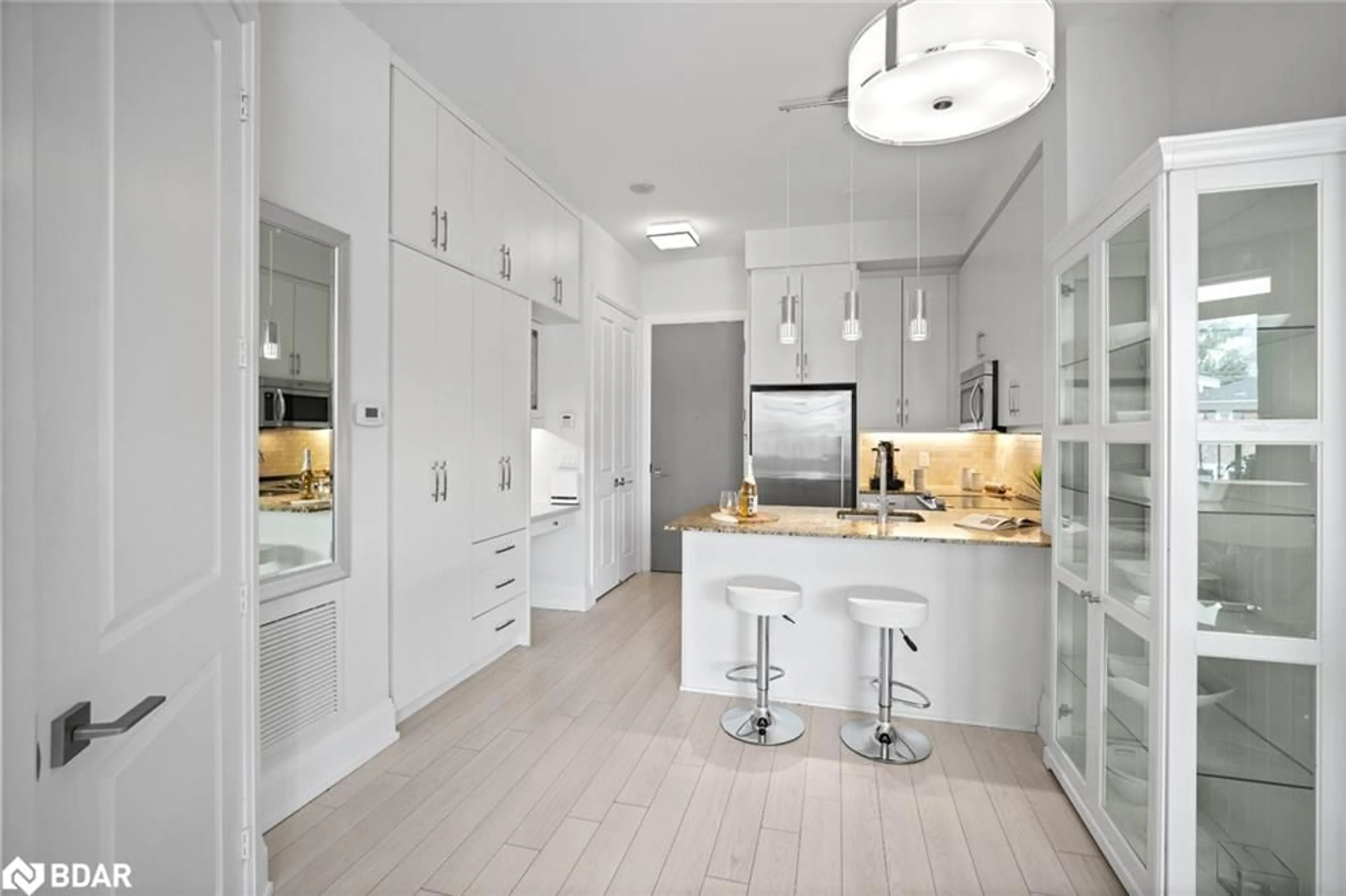 Contemporary kitchen, ceramic/tile floor for 2 Old Mill Dr #103, York Ontario M6S 0A2