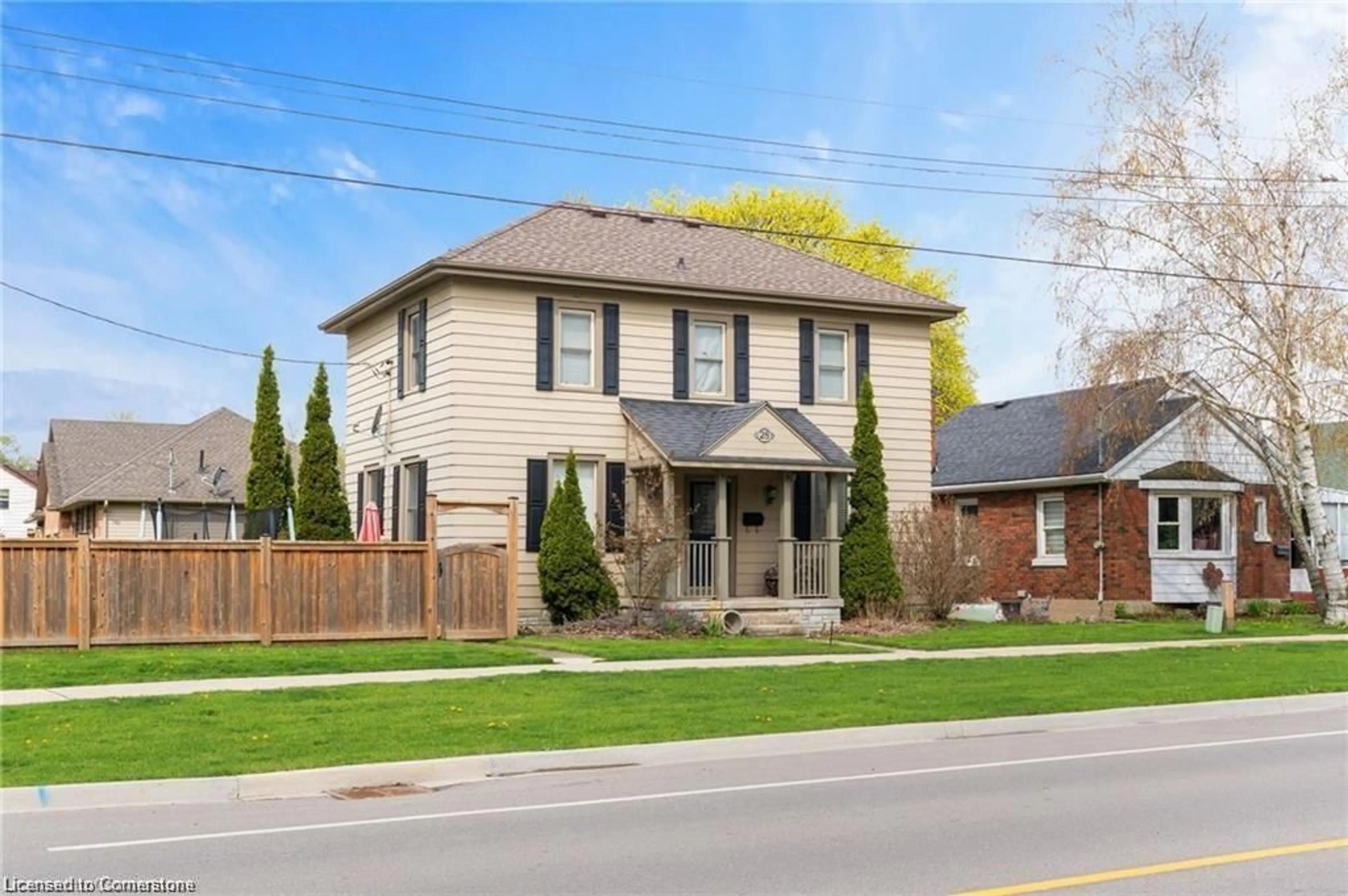 Home with brick exterior material, street for 28 Market St, Paris Ontario N3L 3A8