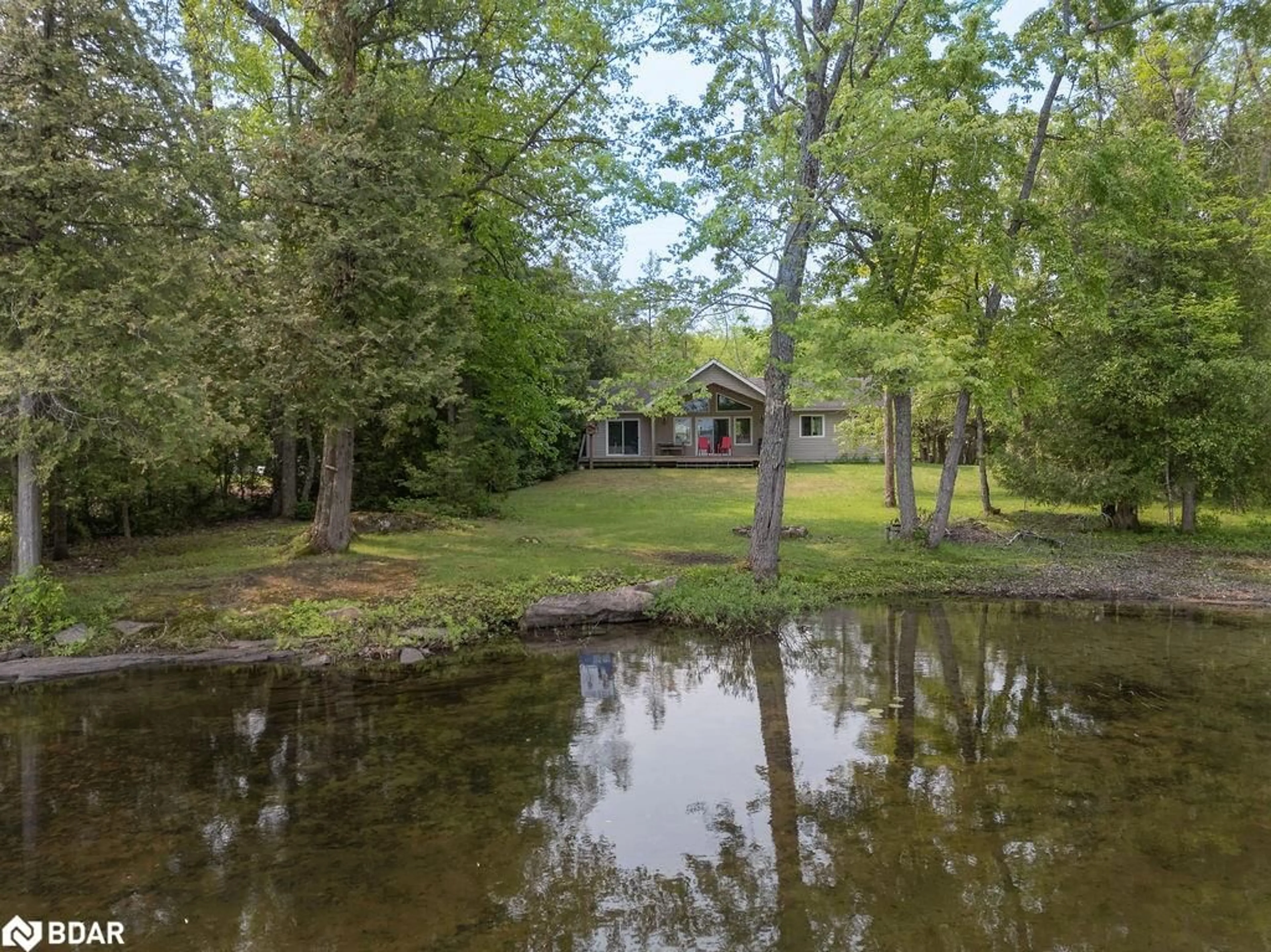 A pic from outside/outdoor area/front of a property/back of a property/a pic from drone, water/lake/river/ocean view for 17 Chester Lane, Kirkfield Ontario K0M 2B0