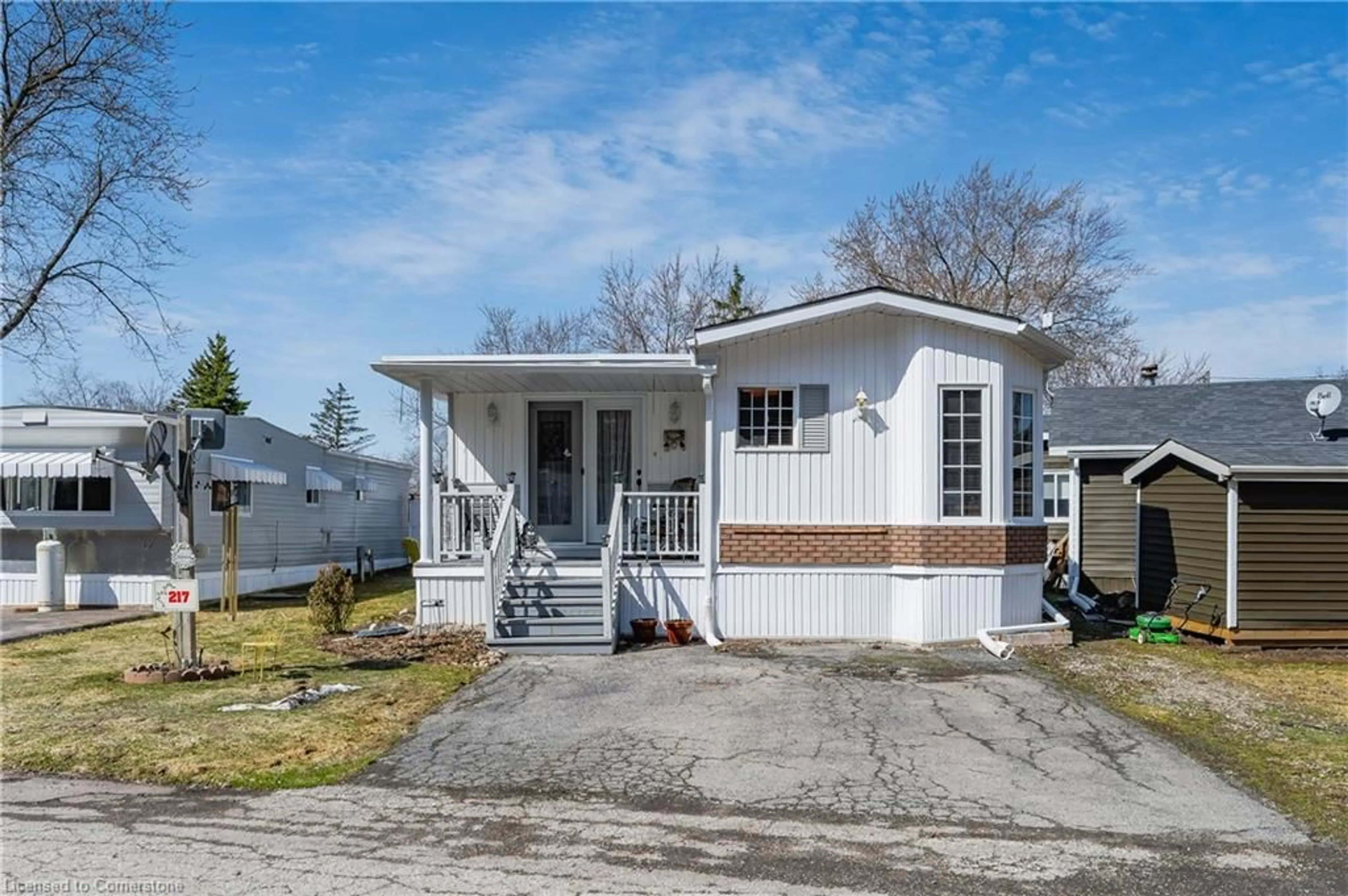 Home with vinyl exterior material, street for 580 Beaver Creek Rd #217, Waterloo Ontario N2J 3Z4