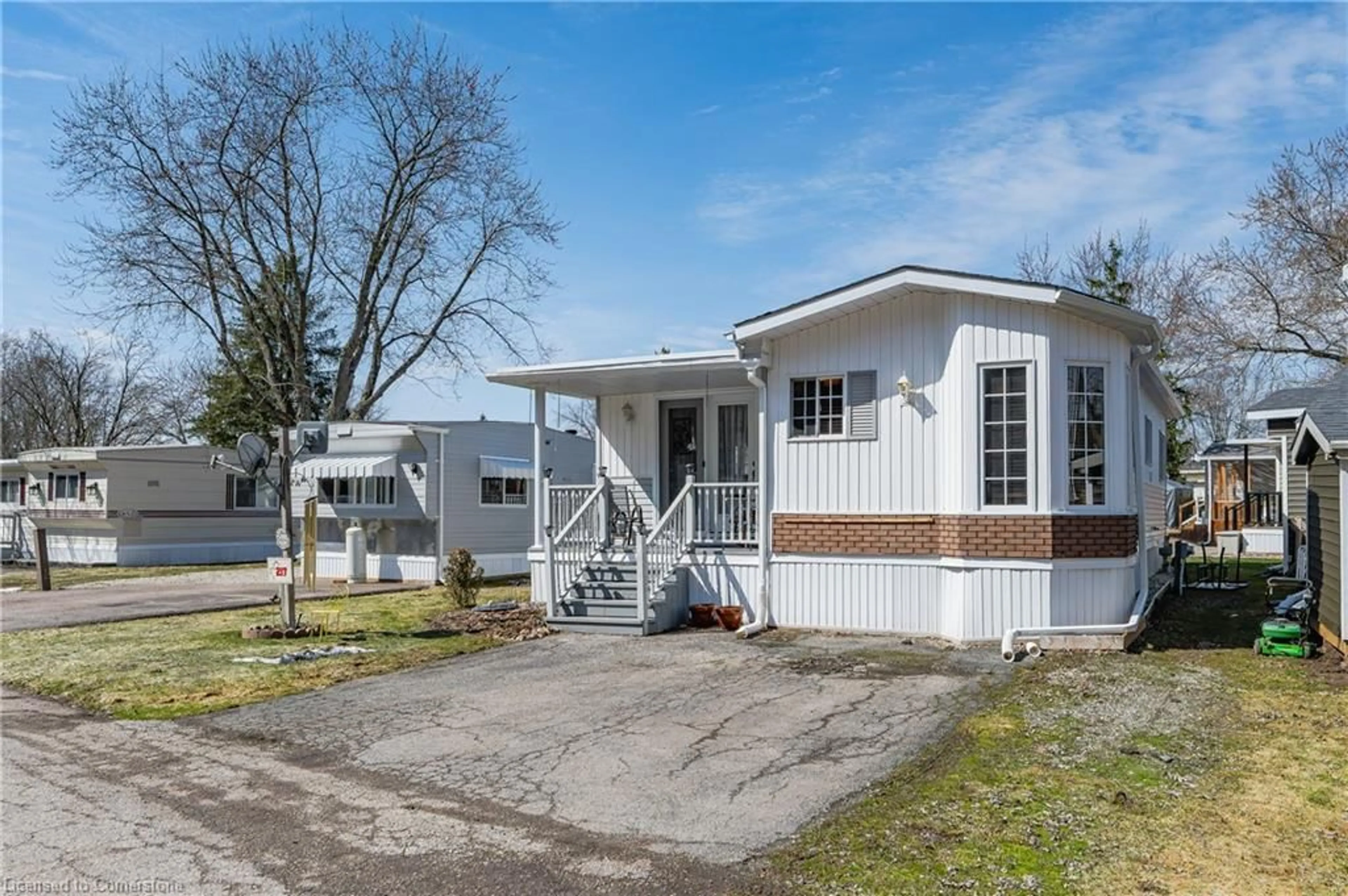 Home with vinyl exterior material, street for 580 Beaver Creek Rd #217, Waterloo Ontario N2J 3Z4