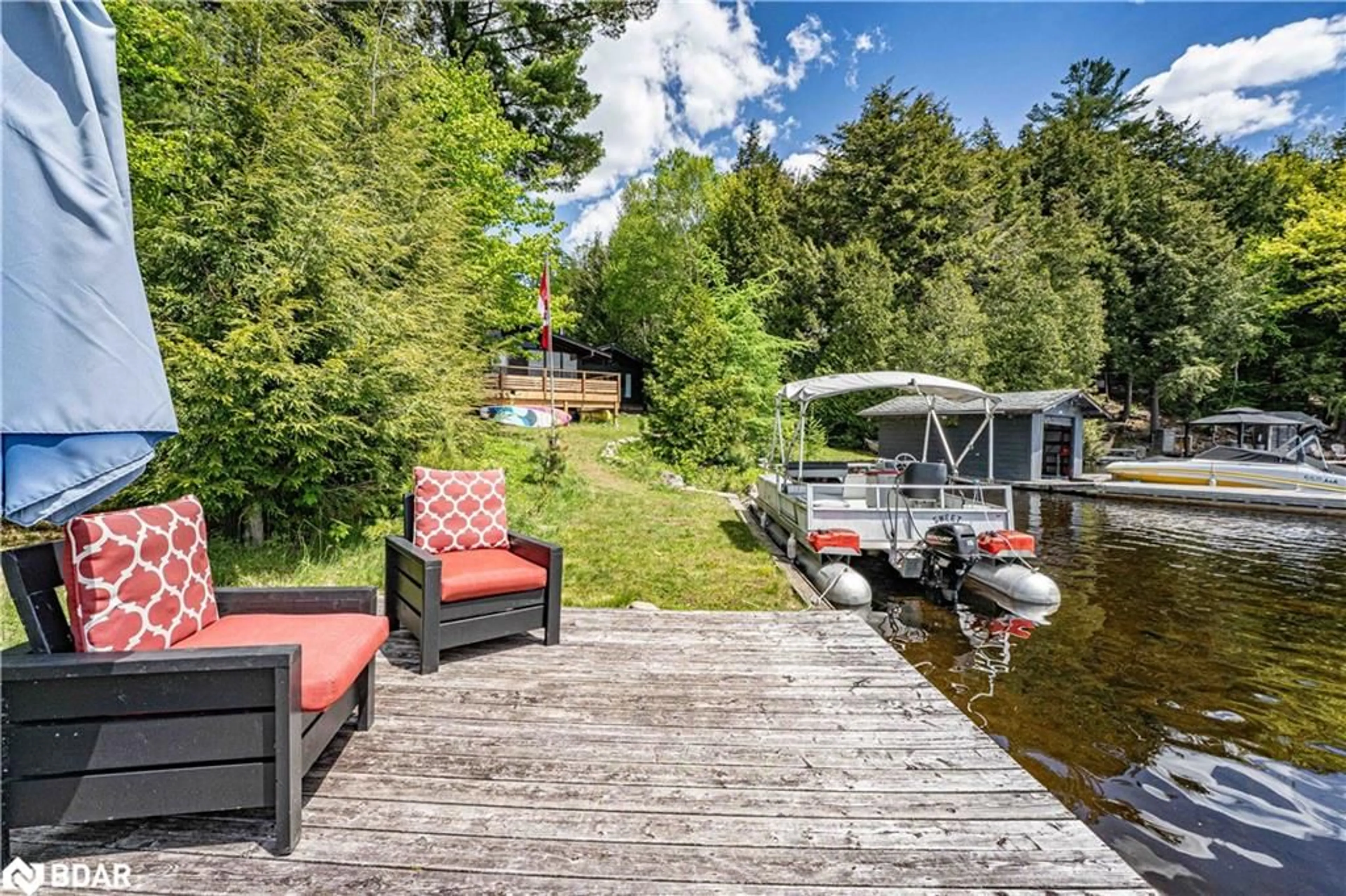 Patio, water/lake/river/ocean view for 228 Macbeth Island Island, Bracebridge Ontario P1L 1X1