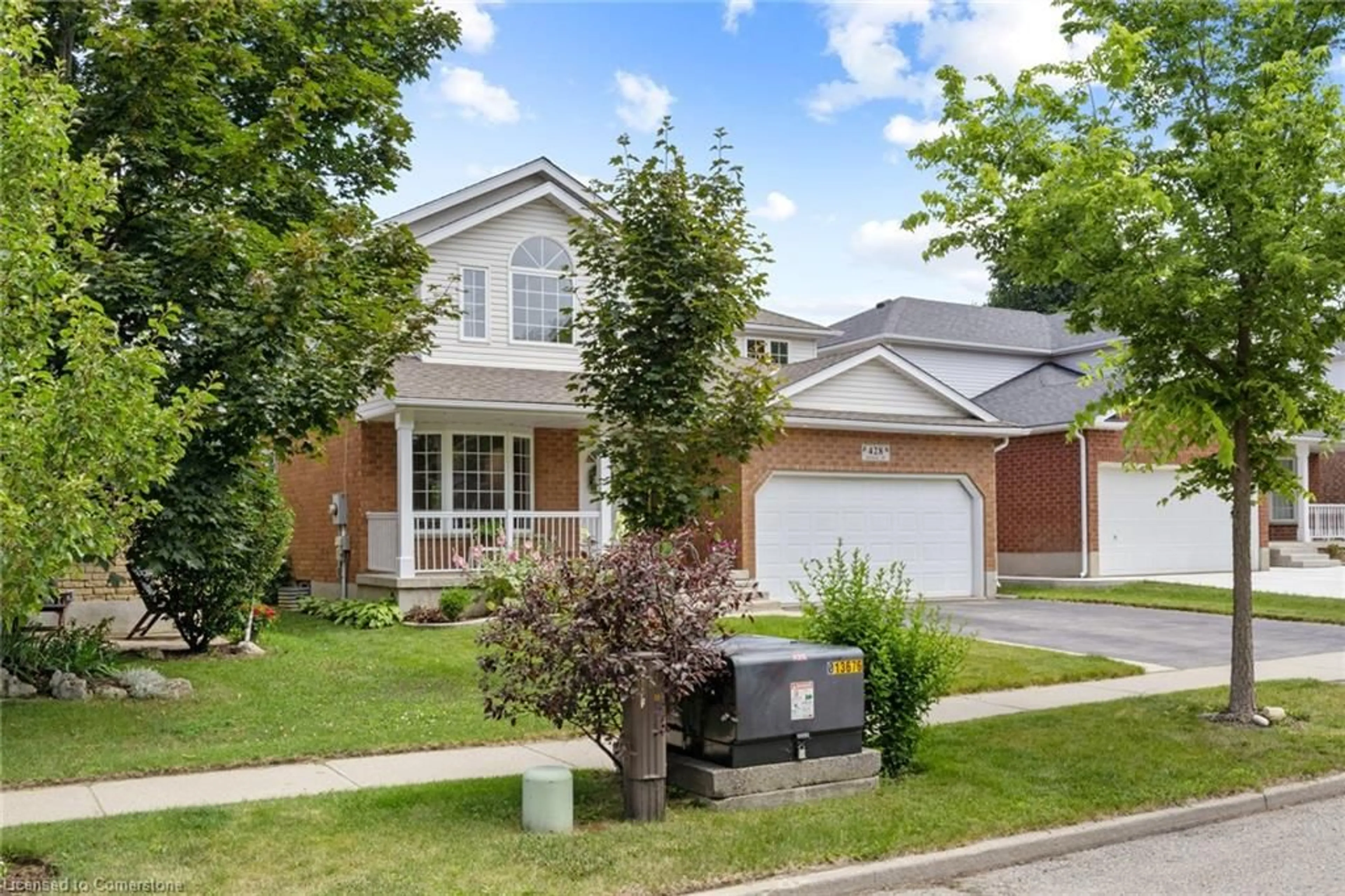 Home with brick exterior material, street for 428 Dansbury Dr, Waterloo Ontario N2K 3X9