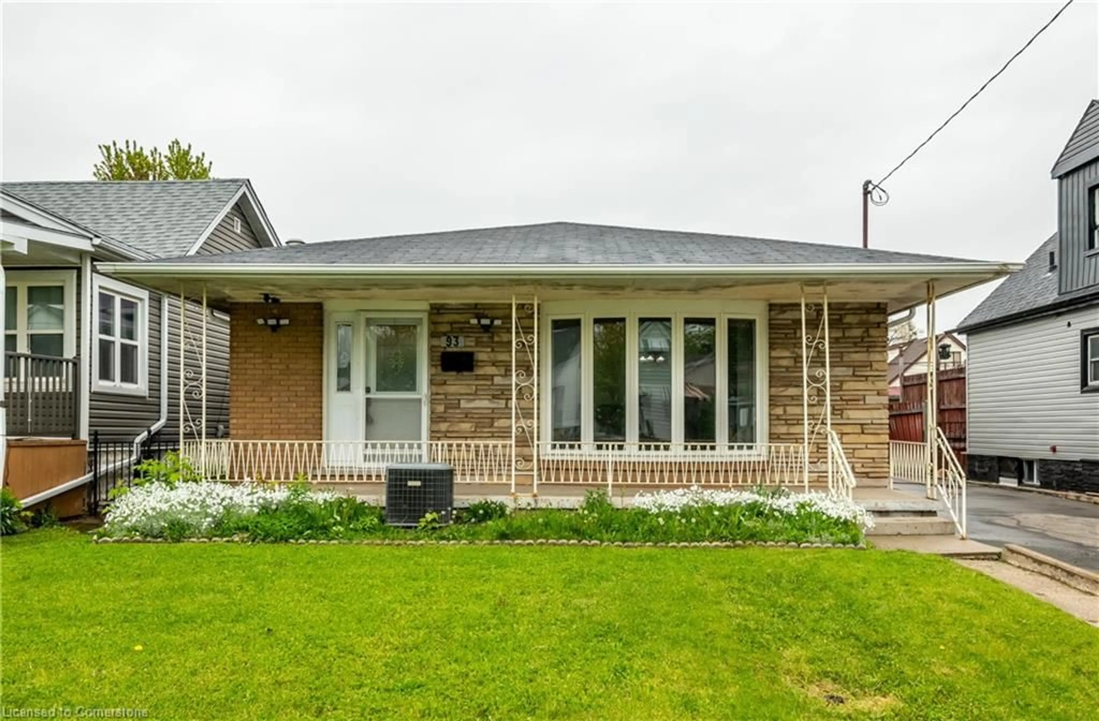 Home with brick exterior material, street for 93 Adair Ave, Hamilton Ontario L8H 6A7