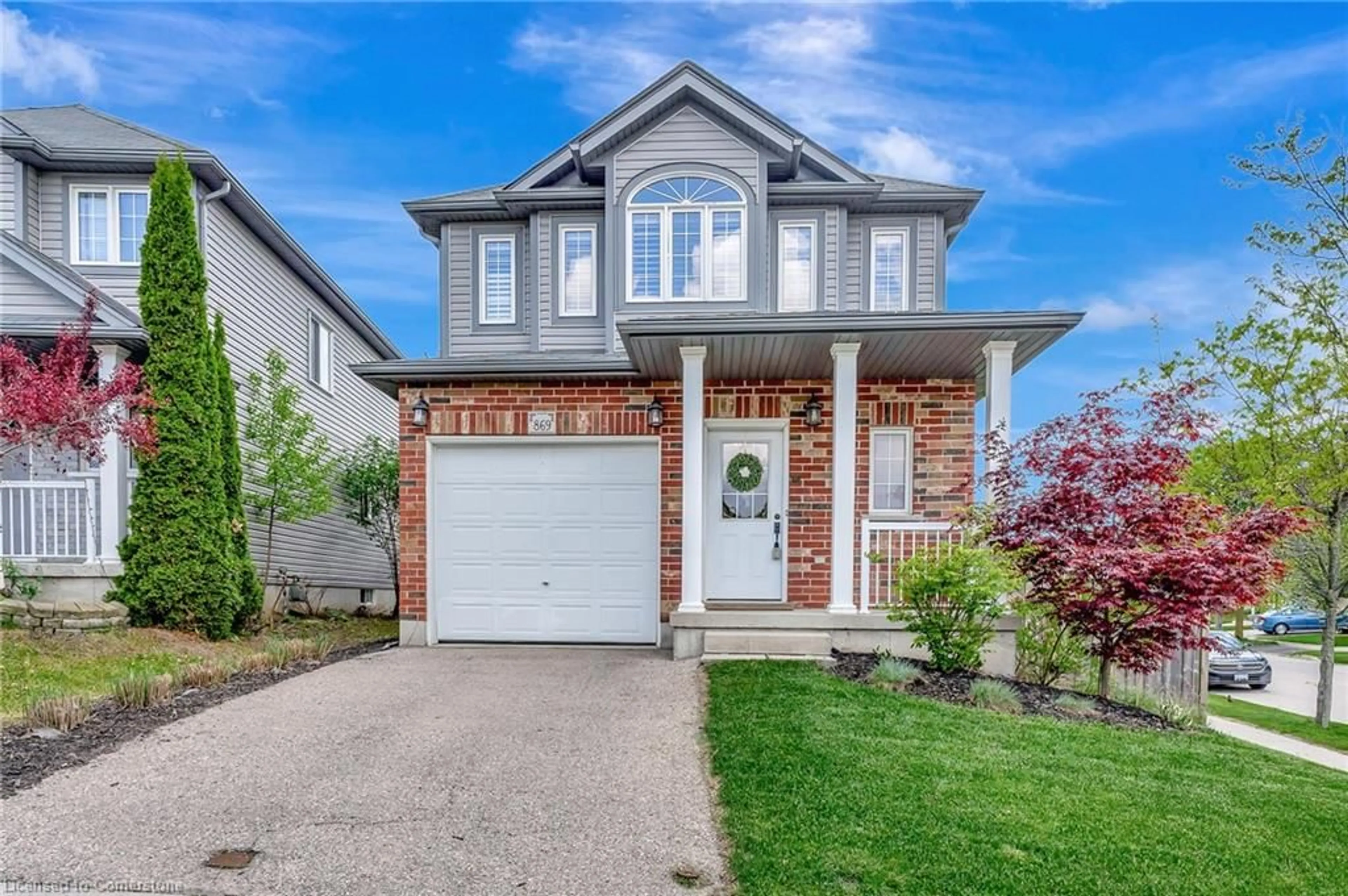 Home with brick exterior material, street for 869 Laurelwood Dr, Waterloo Ontario N2V 2X8