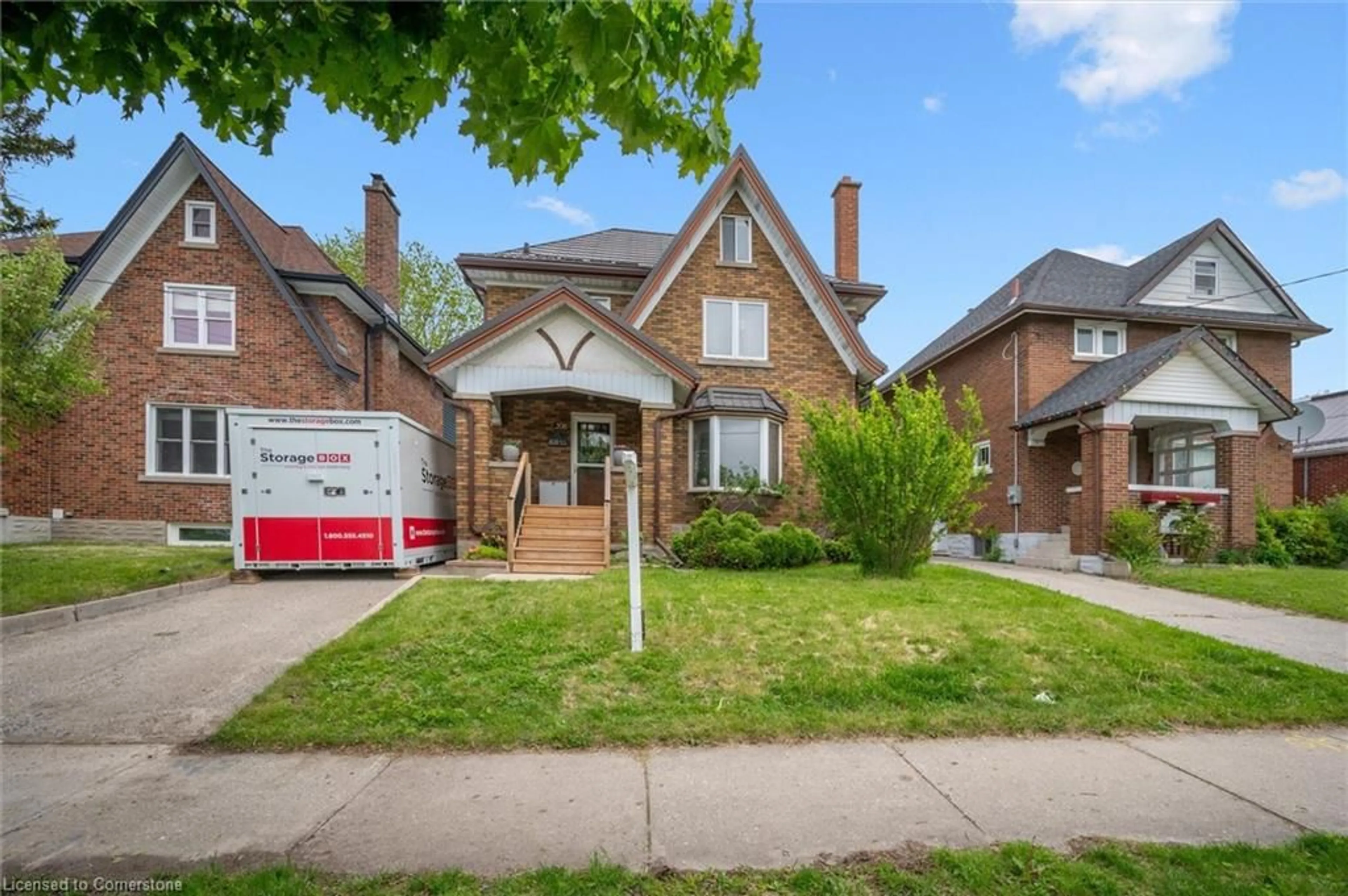 Home with brick exterior material, street for 208 Stirling Ave, Kitchener Ontario N2G 3N9