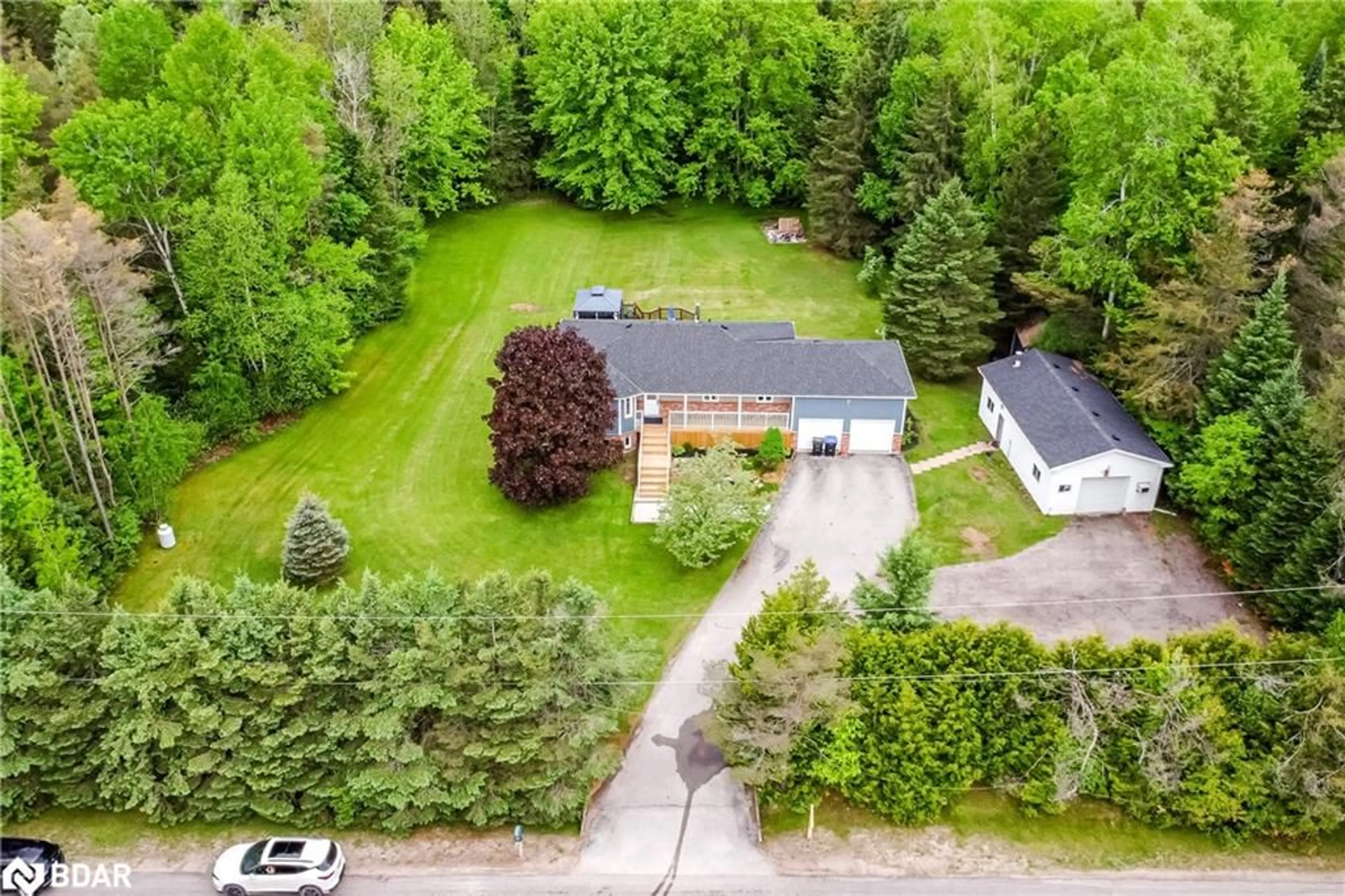 A pic from outside/outdoor area/front of a property/back of a property/a pic from drone, unknown for 8468 8th Line, Utopia Ontario L0M 1T0
