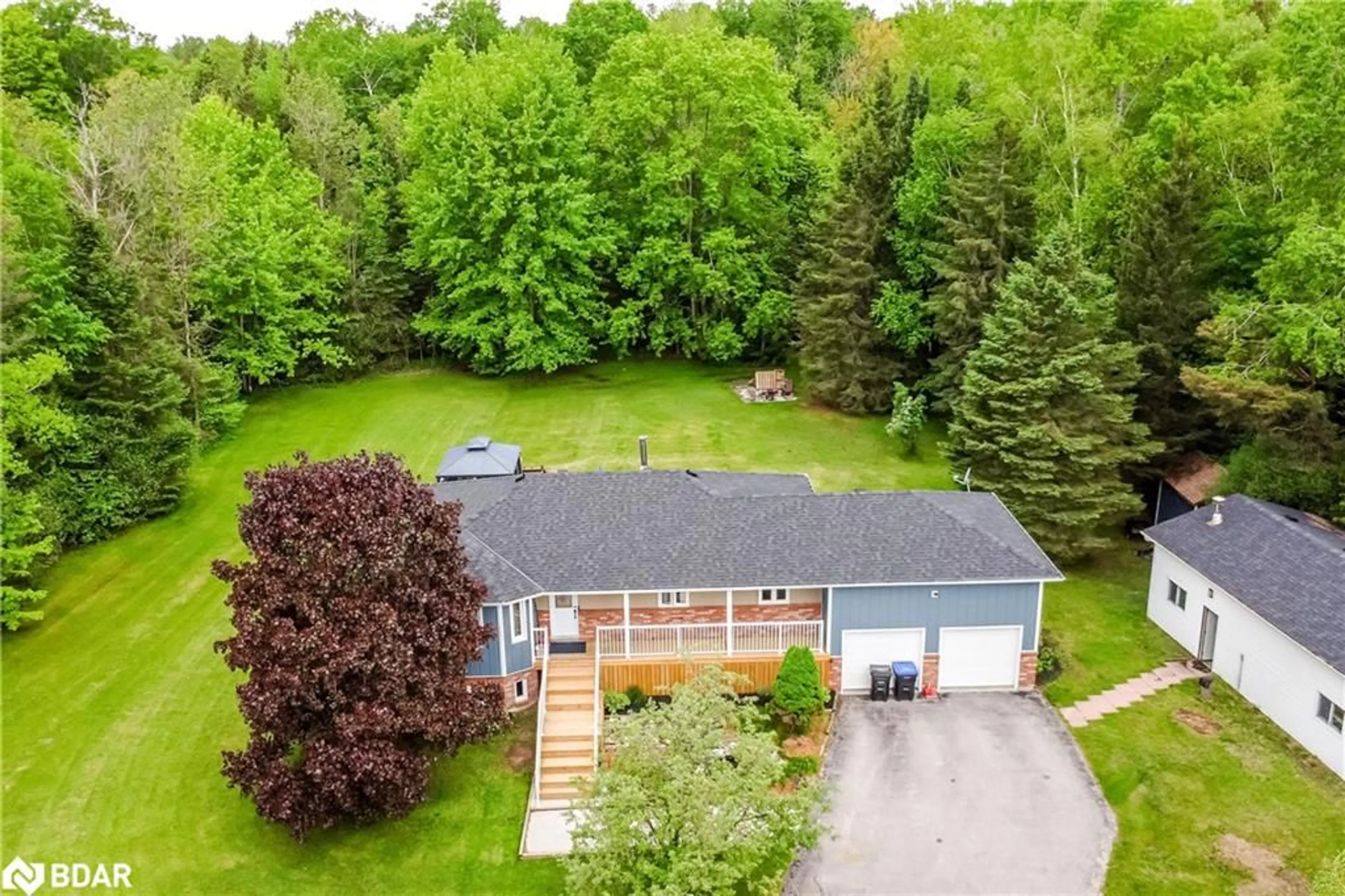 A pic from outside/outdoor area/front of a property/back of a property/a pic from drone, water/lake/river/ocean view for 8468 8th Line, Utopia Ontario L0M 1T0