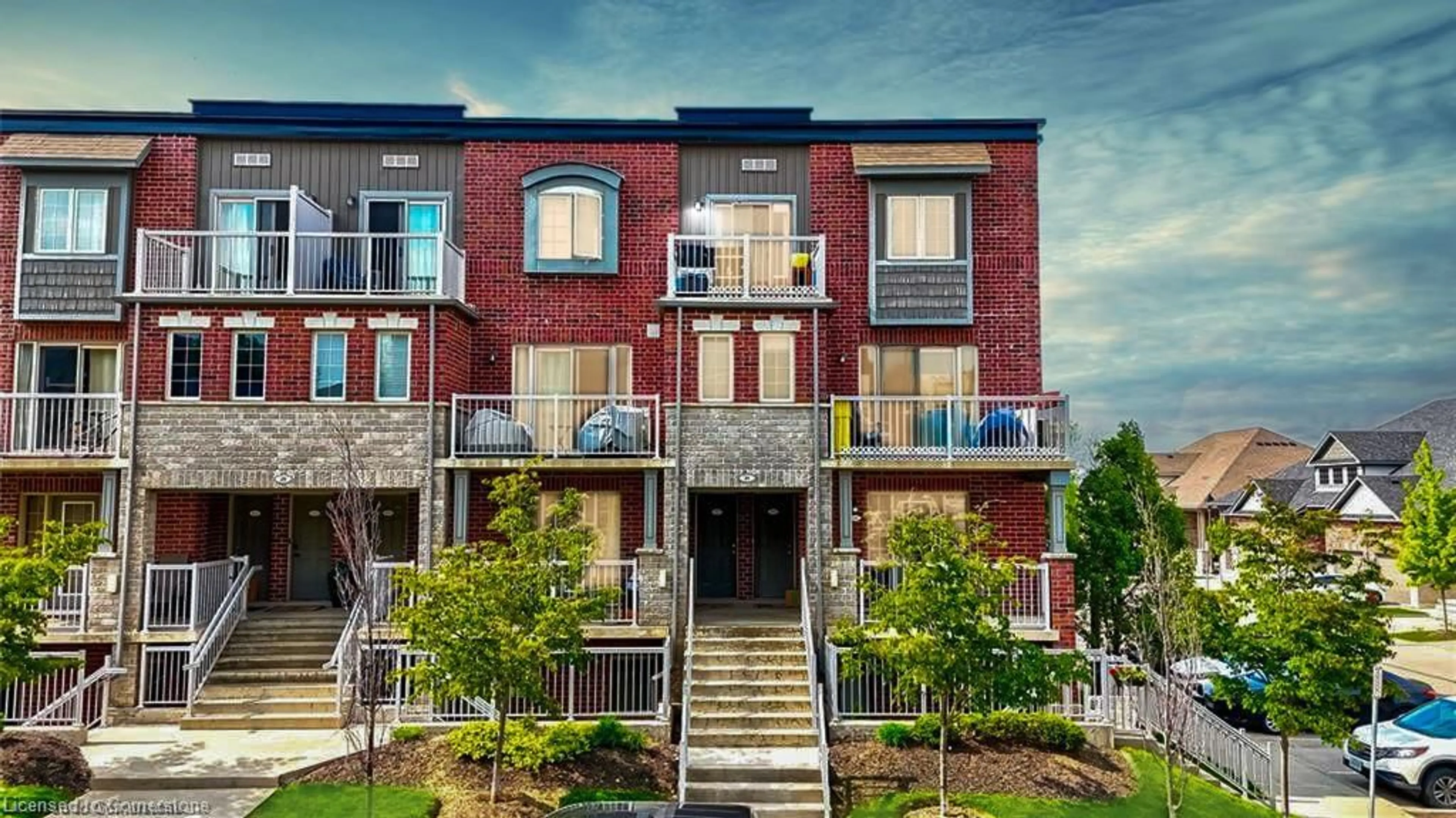 Home with brick exterior material, street for 31 Sienna St #A, Kitchener Ontario N2R 0H8