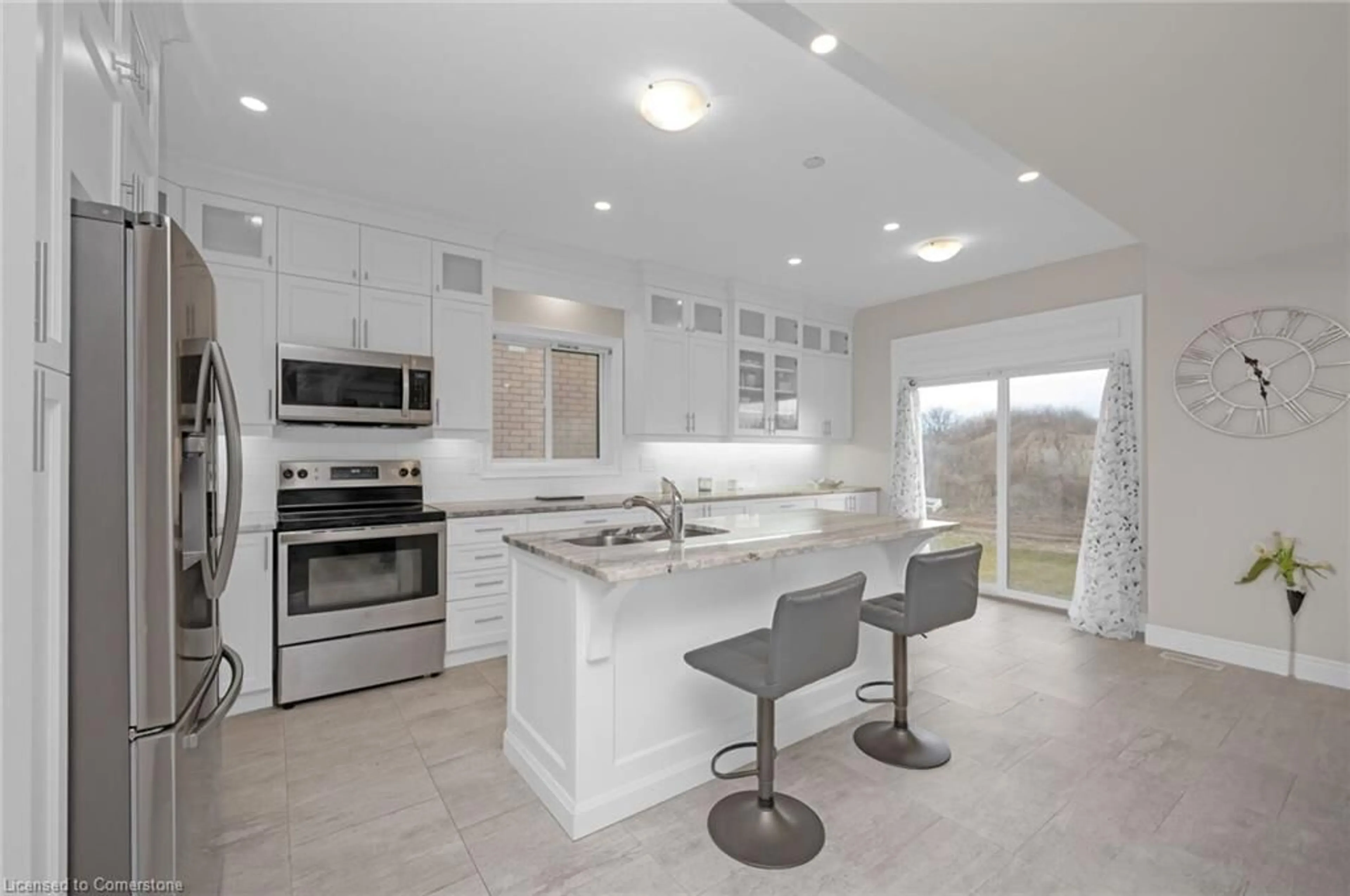 Open concept kitchen, ceramic/tile floor for 61 Eleanor Ave, Hamilton Ontario L8W 1C7