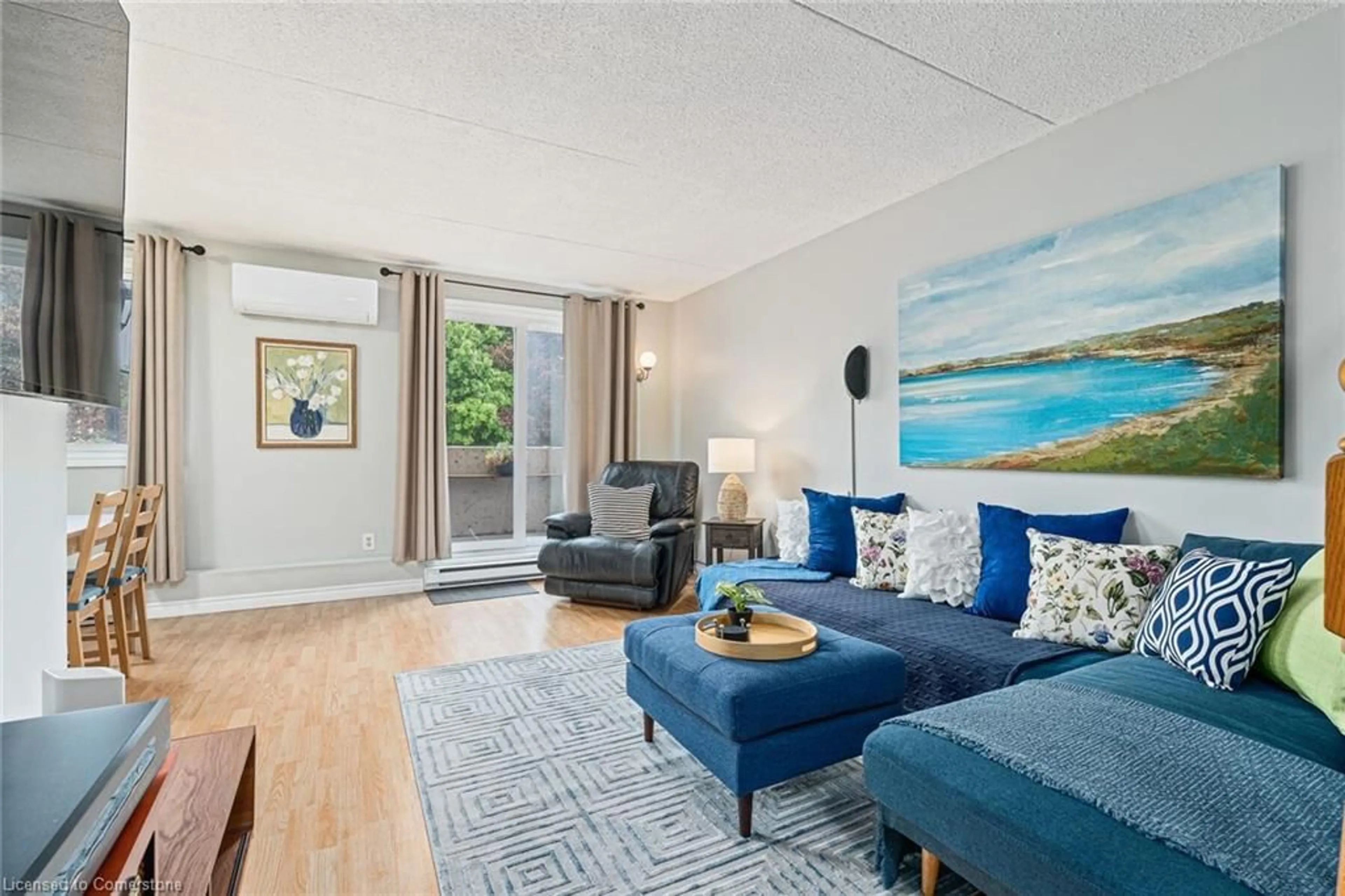 Living room with furniture, wood/laminate floor for 42 Tannery St #236, Cambridge Ontario N3C 2B9