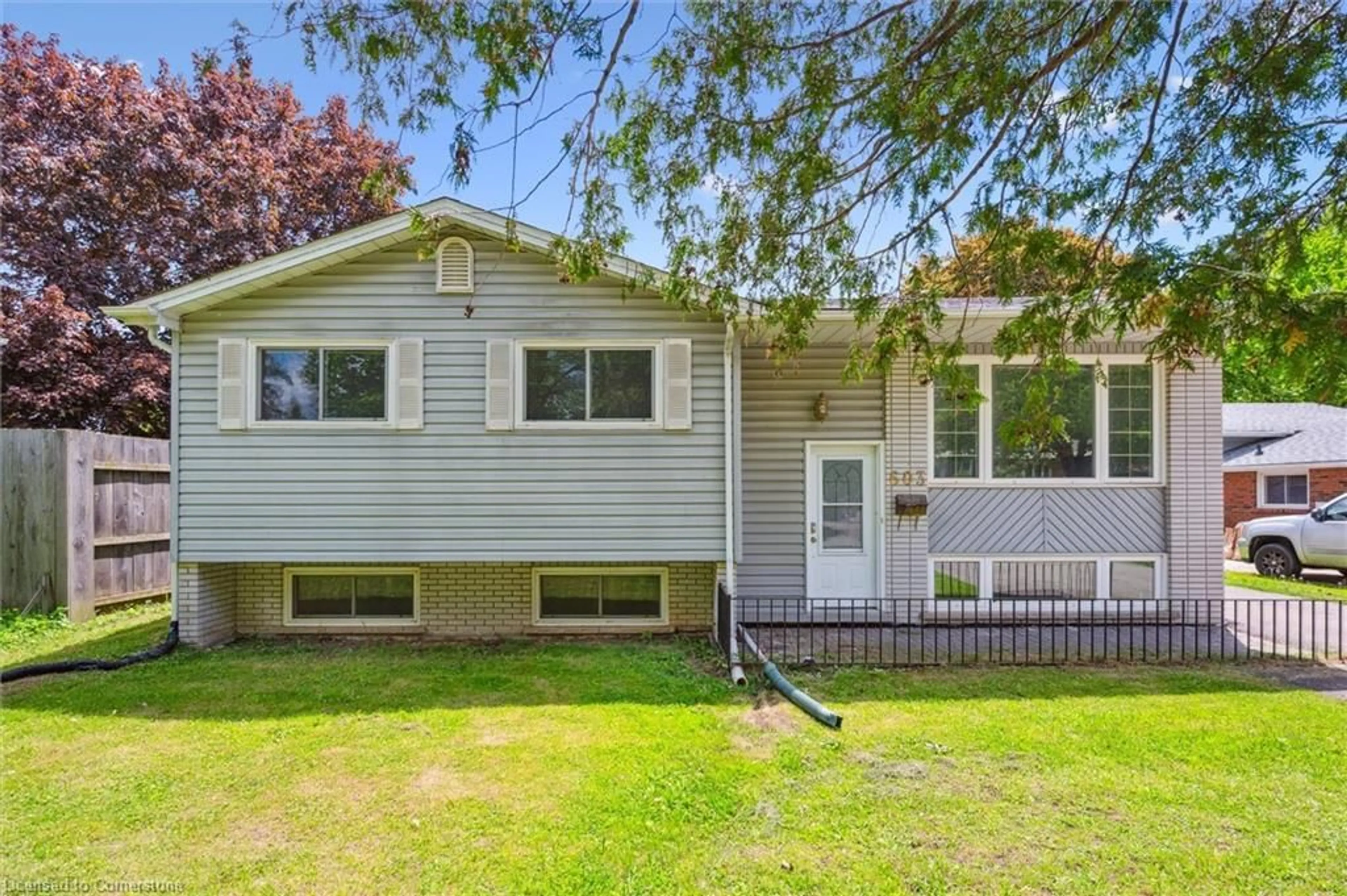 Home with vinyl exterior material, street for 603 Mount Anne Dr, Waterloo Ontario N2L 4W6