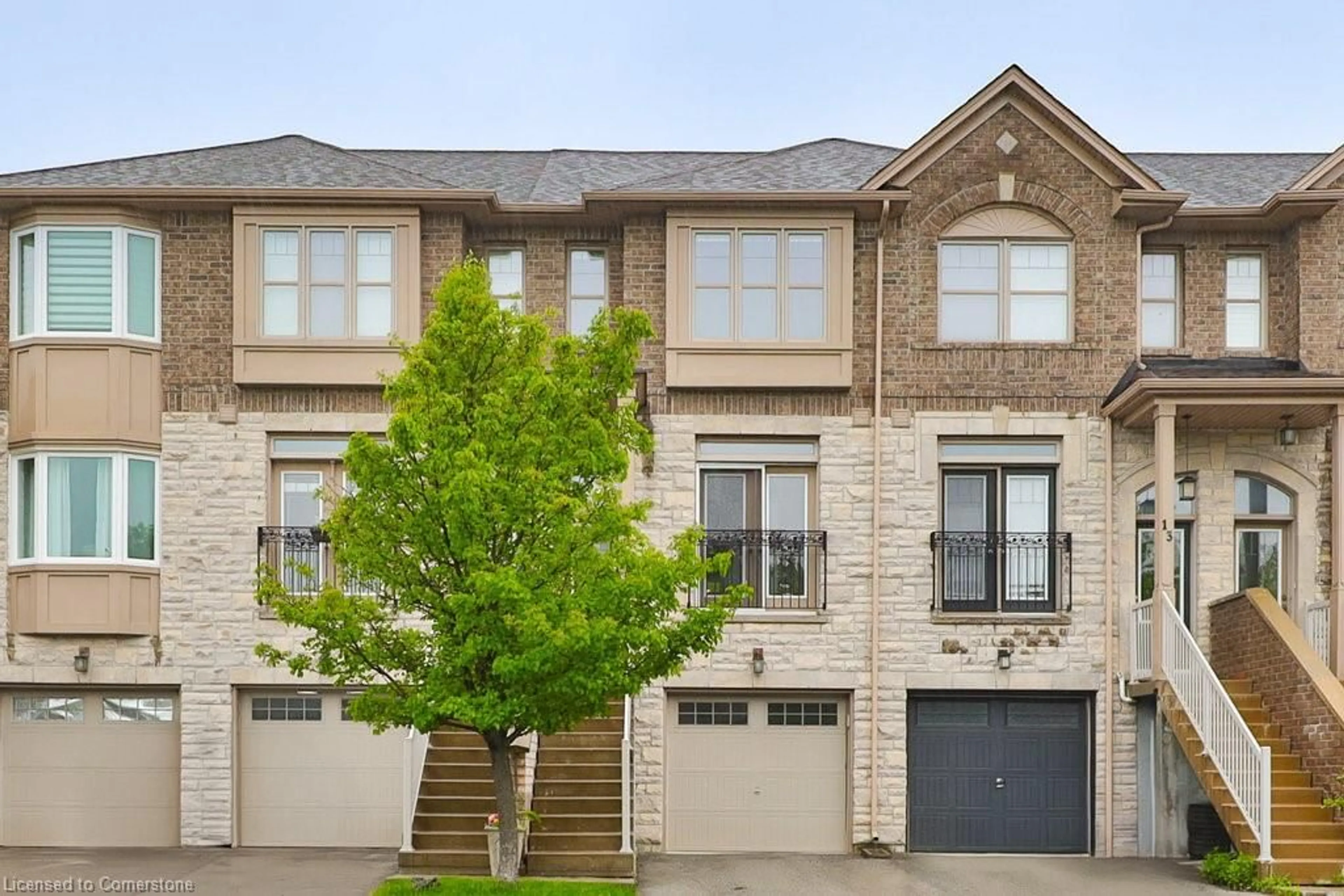 Home with brick exterior material, street for 2410 Woodstock Trail #14, Oakville Ontario L6M 0L3