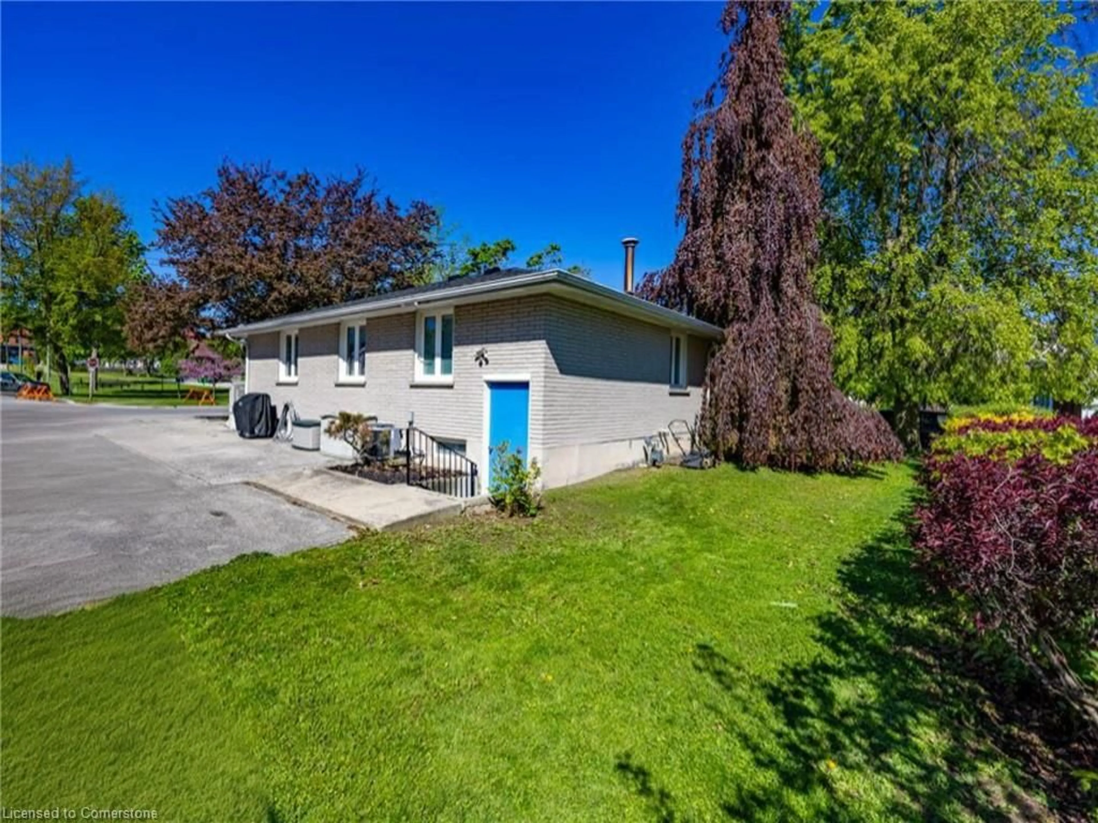 A pic from outside/outdoor area/front of a property/back of a property/a pic from drone, street for 100 Market St E, Port Dover Ontario N0A 1N0