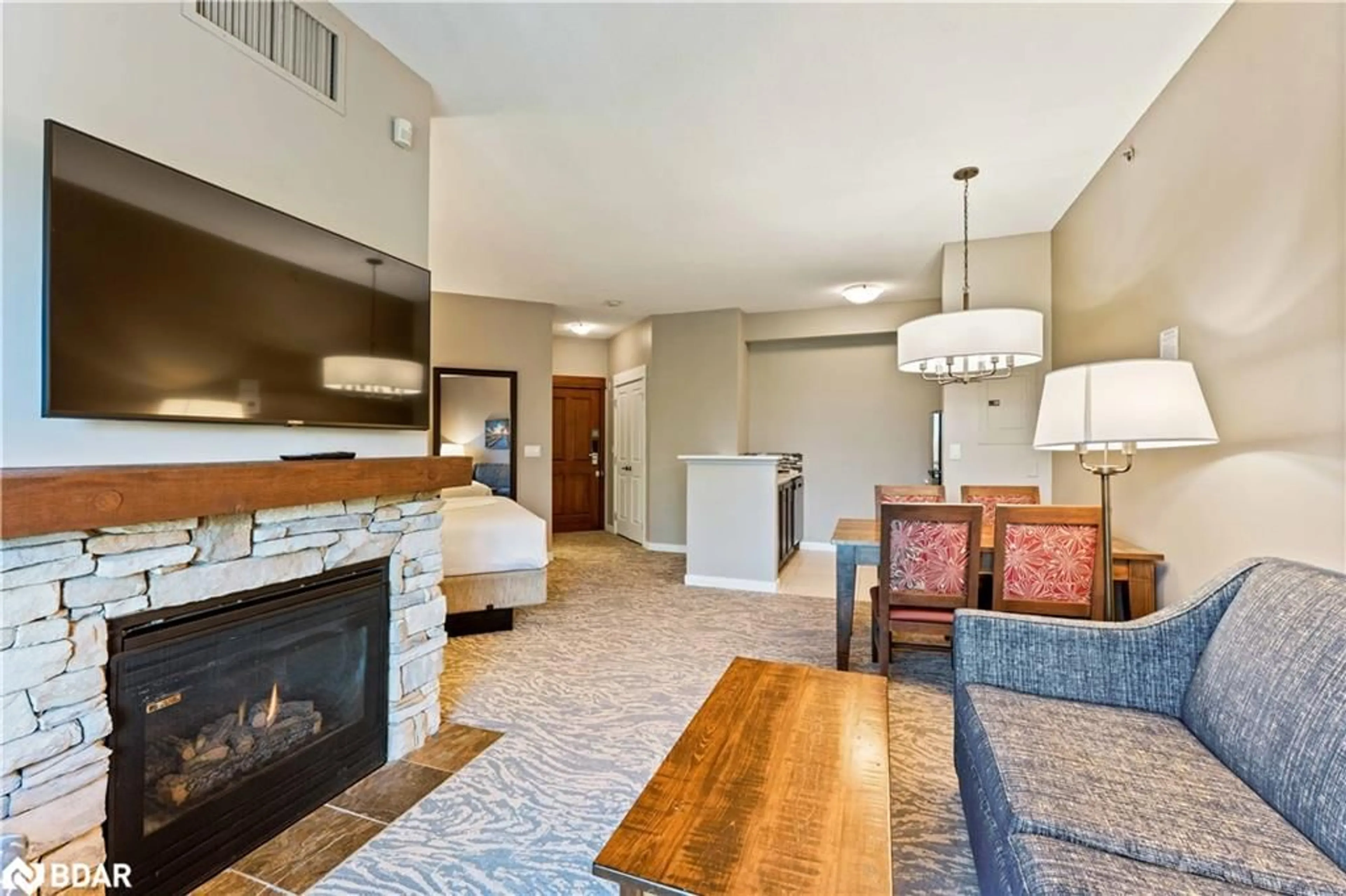Living room with furniture, unknown for 156 Jozo Weider Blvd #437, The Blue Mountains Ontario L9Y 0V2
