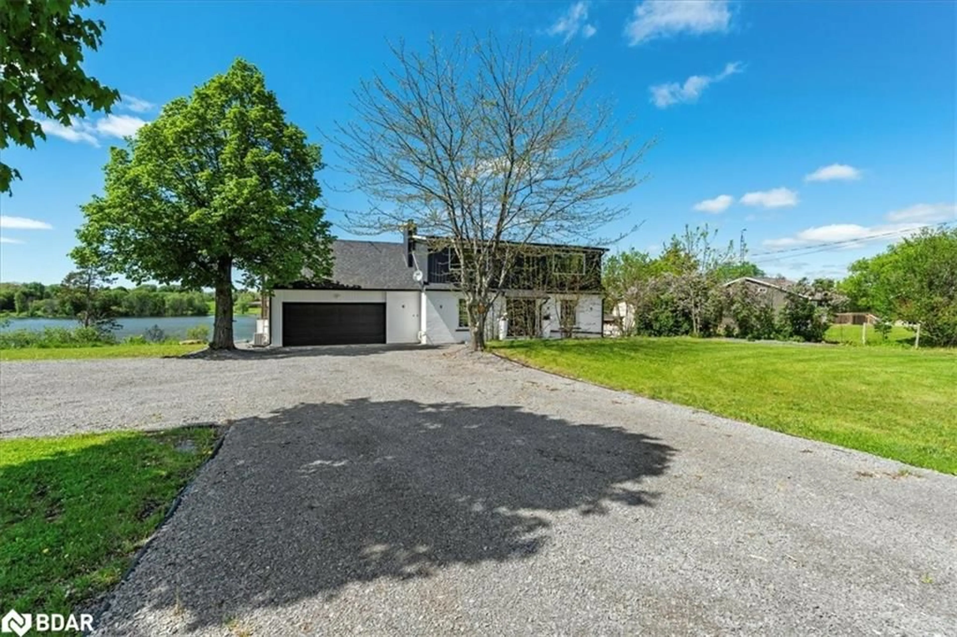 A pic from outside/outdoor area/front of a property/back of a property/a pic from drone, street for 1223 South Shore Rd, Napanee Ontario K7R 3K7