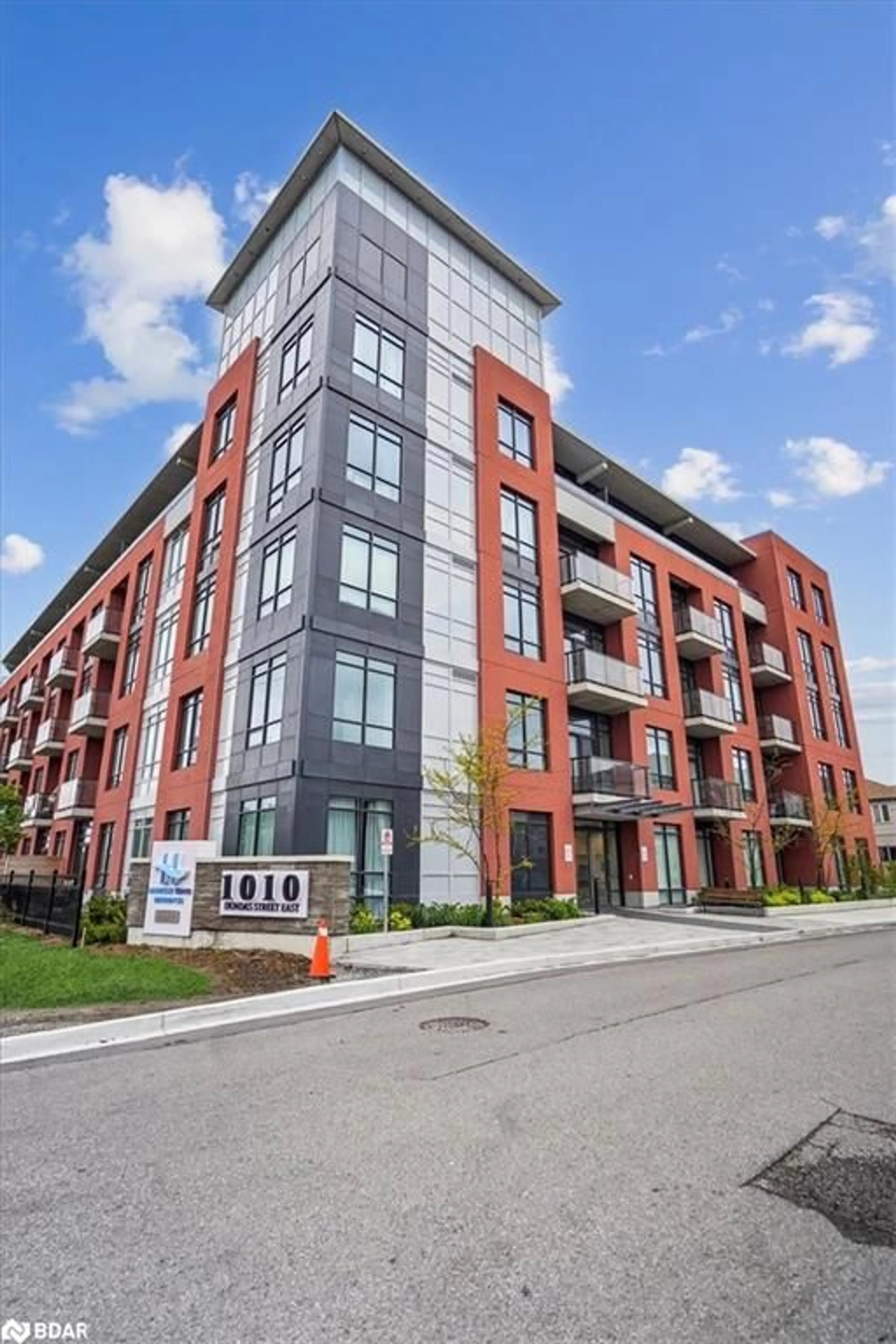 Home with brick exterior material, building for 1010 Dundas St #211, Whitby Ontario L1N 2K2