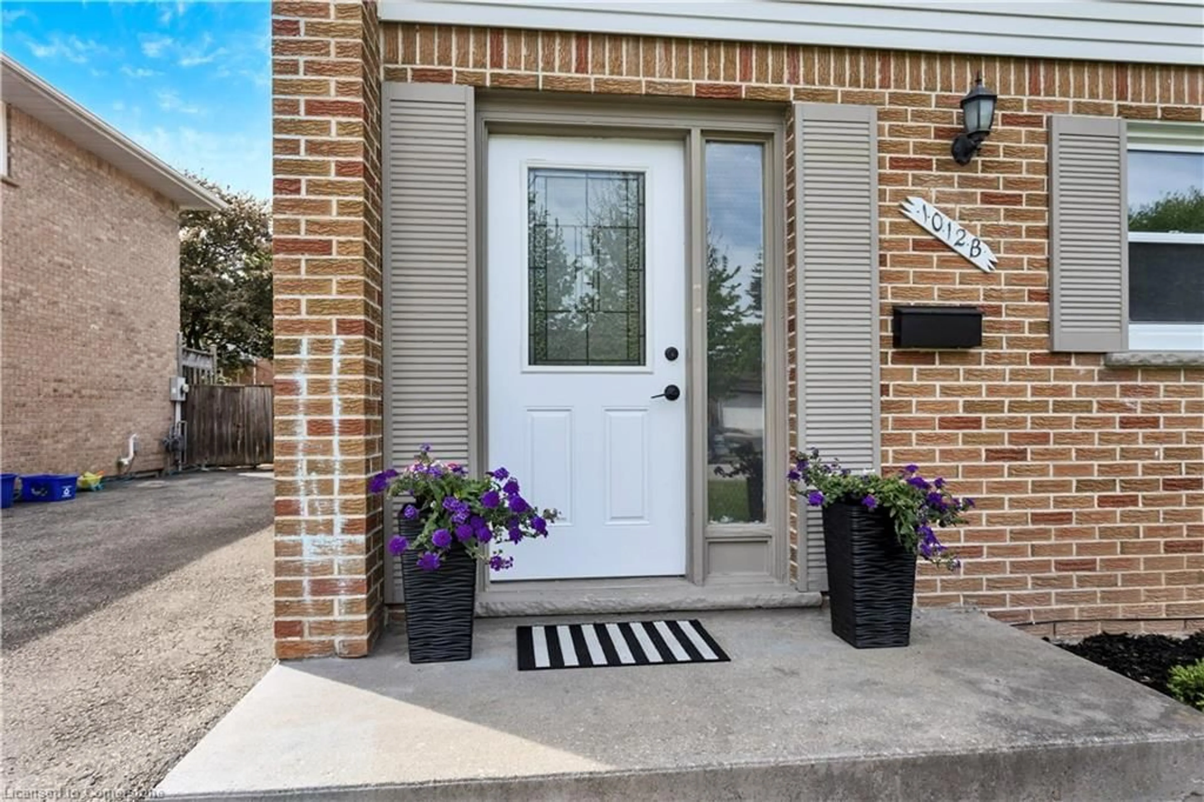 Home with brick exterior material, street for 1012B Nesbitt Cres, Woodstock Ontario N4S 7P1