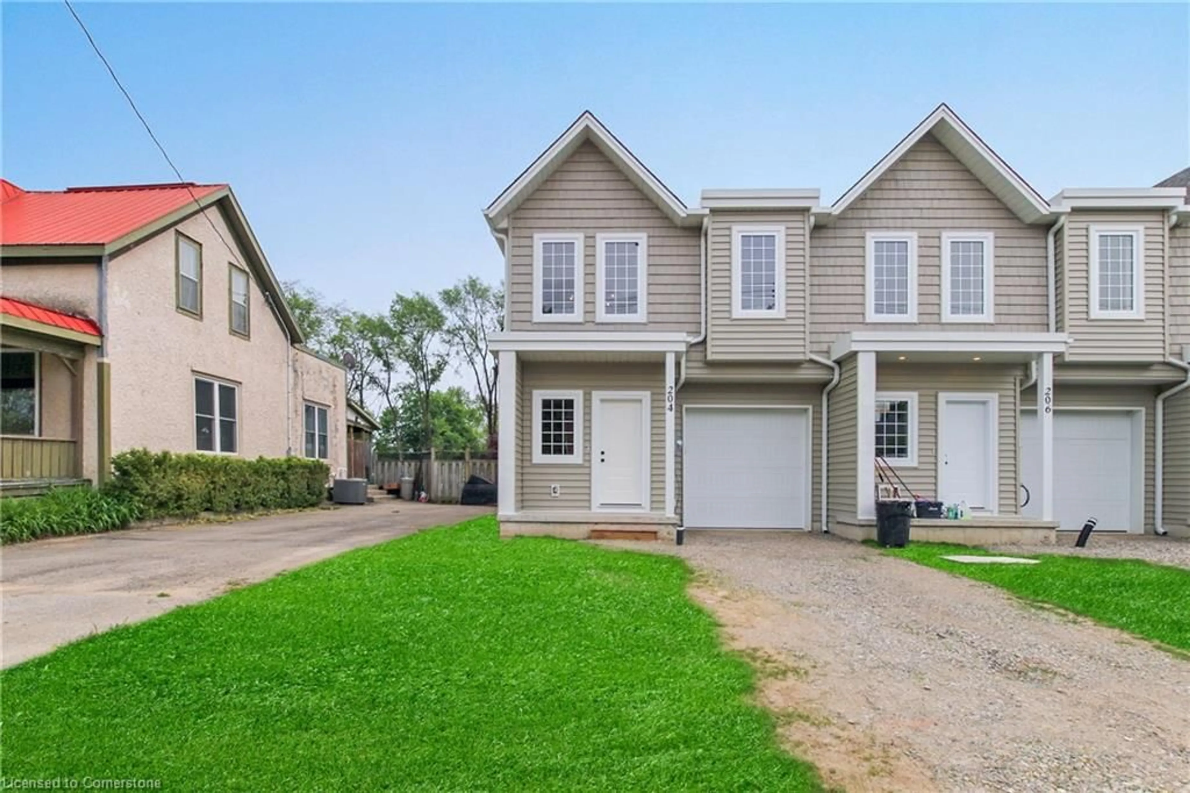 Home with vinyl exterior material, street for 204 William St, Delhi Ontario N4B 1M8