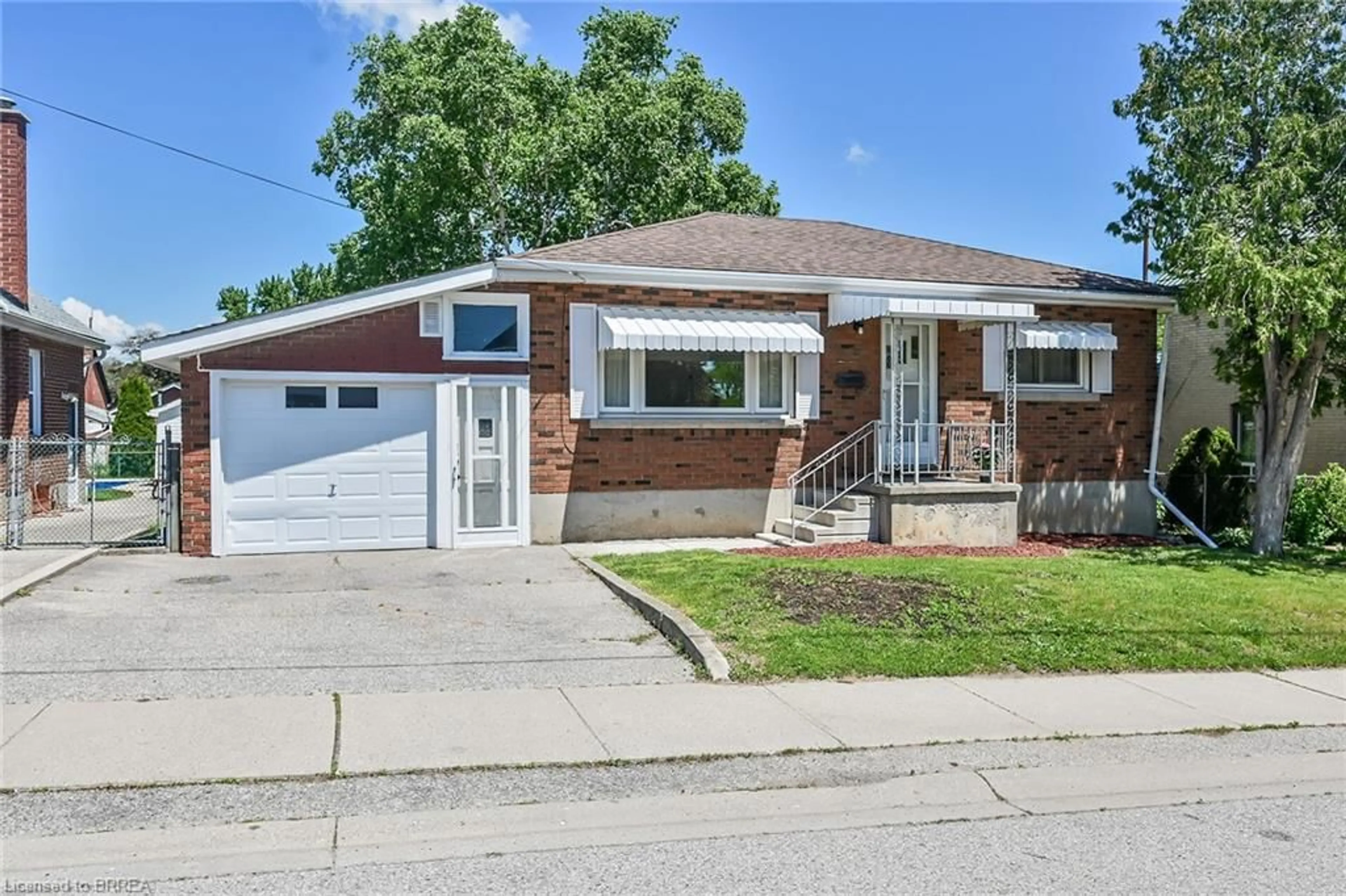 Home with brick exterior material, street for 17 Huff Ave, Brantford Ontario N3R 2A2