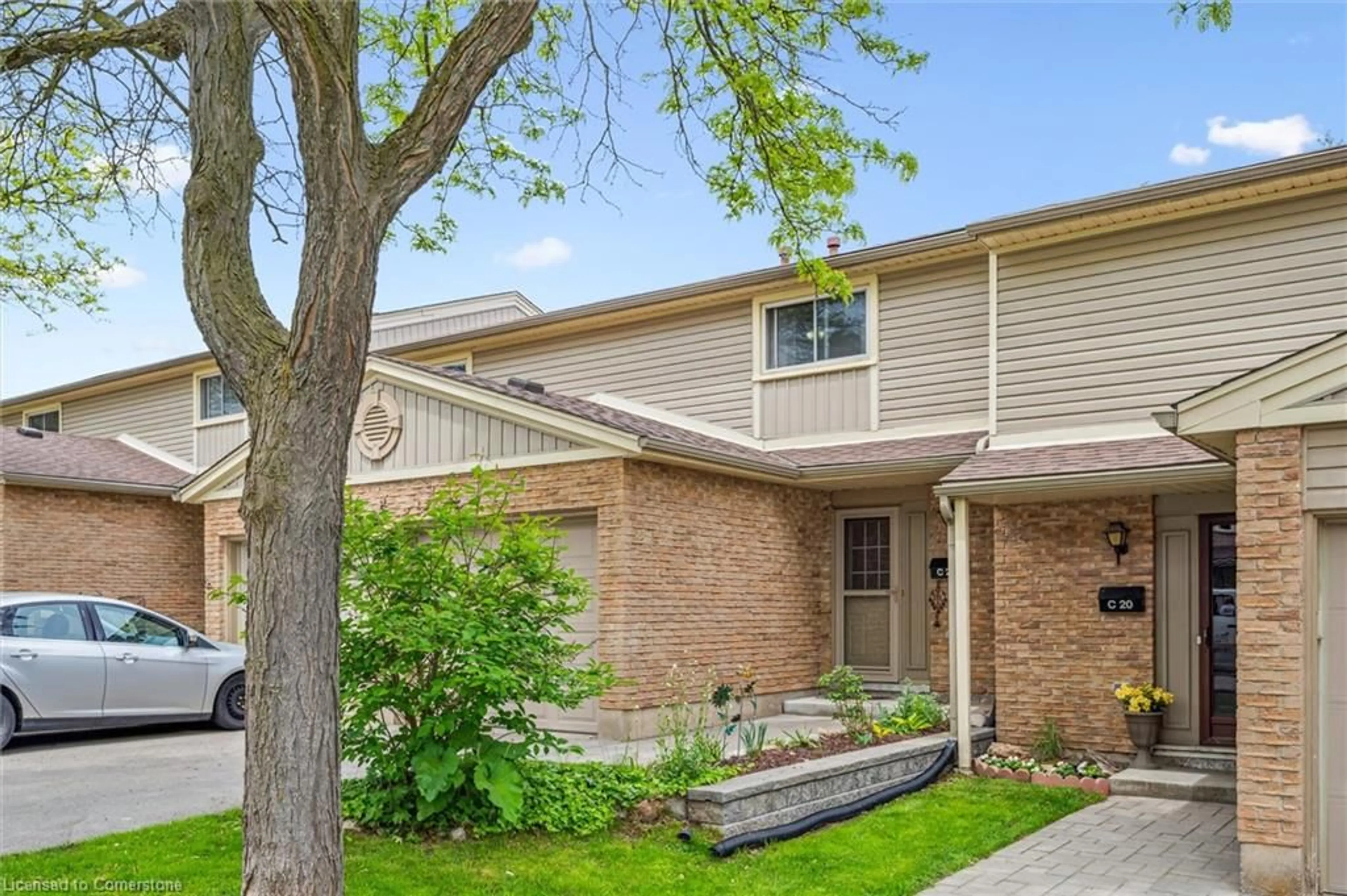 Home with brick exterior material, street for 223 Pioneer Dr #C21, Kitchener Ontario N2P 1L9