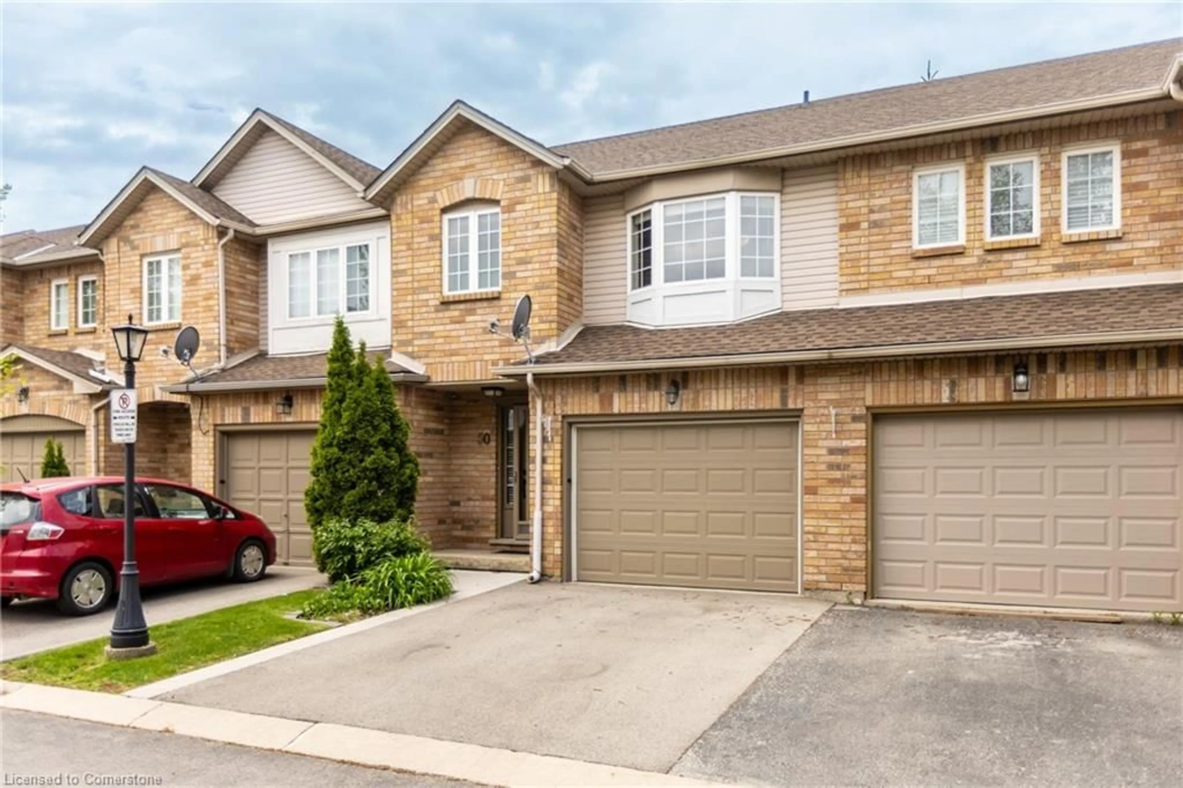 Home with brick exterior material, street for 346 Highland Rd #50, Hamilton Ontario L8J 3T3