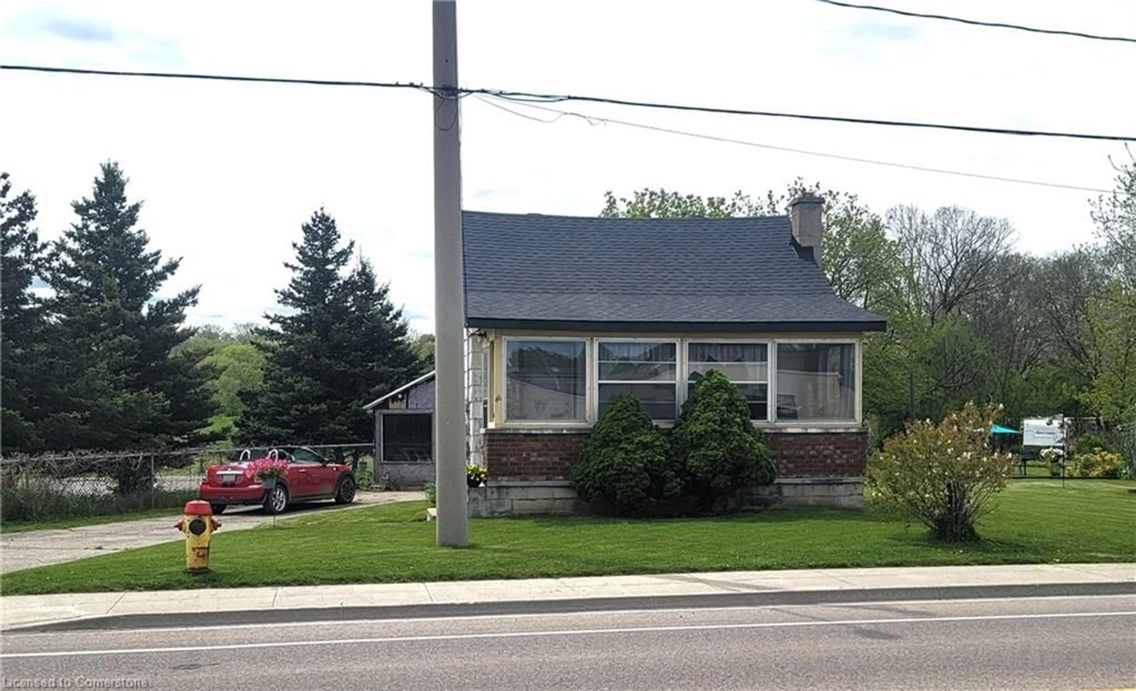 Home with vinyl exterior material, street for 46 Bridge St, Kitchener Ontario N2K 1J6