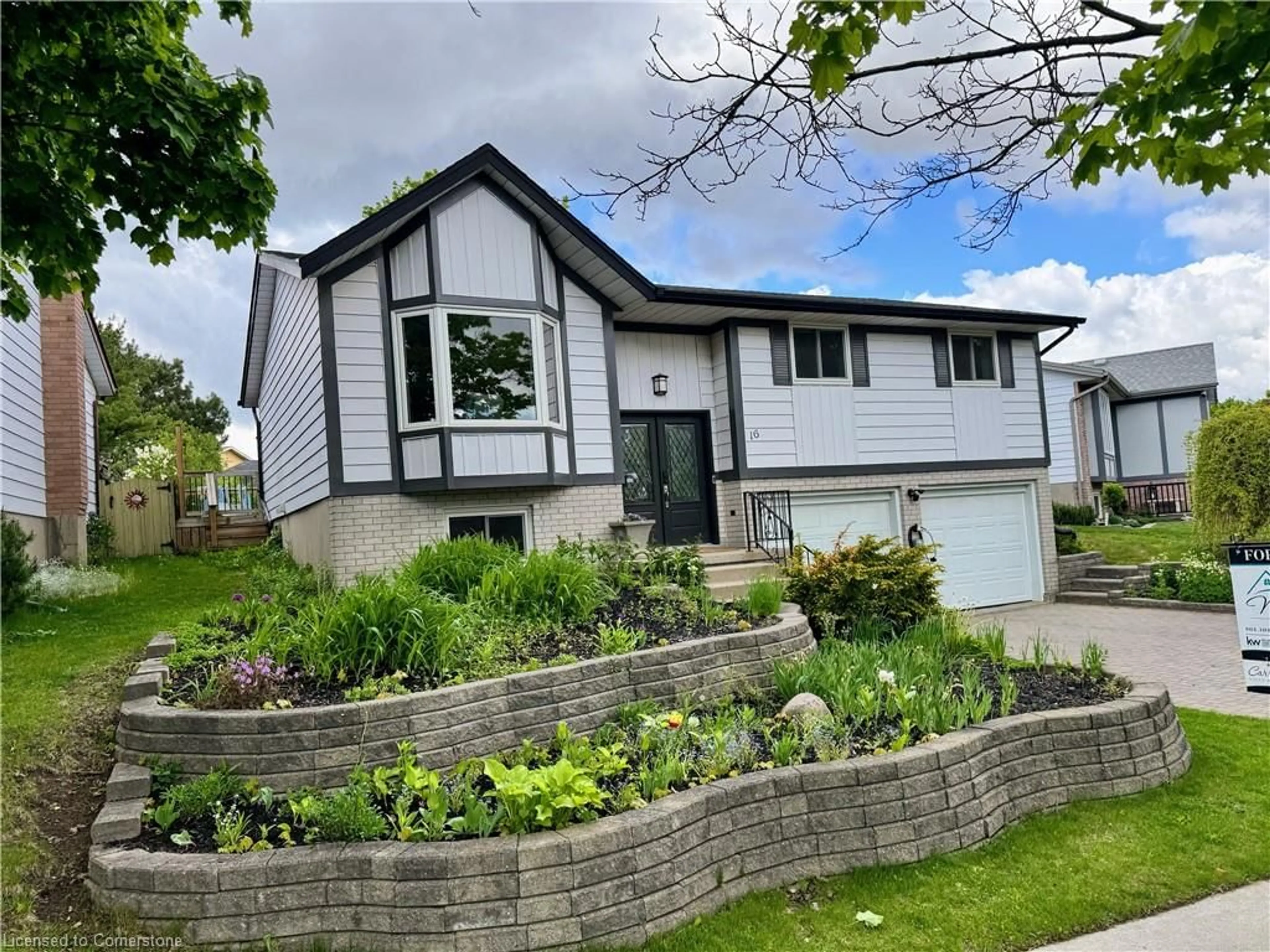 Home with vinyl exterior material, street for 16 Settlers Dr, Kitchener Ontario N2E 2L3