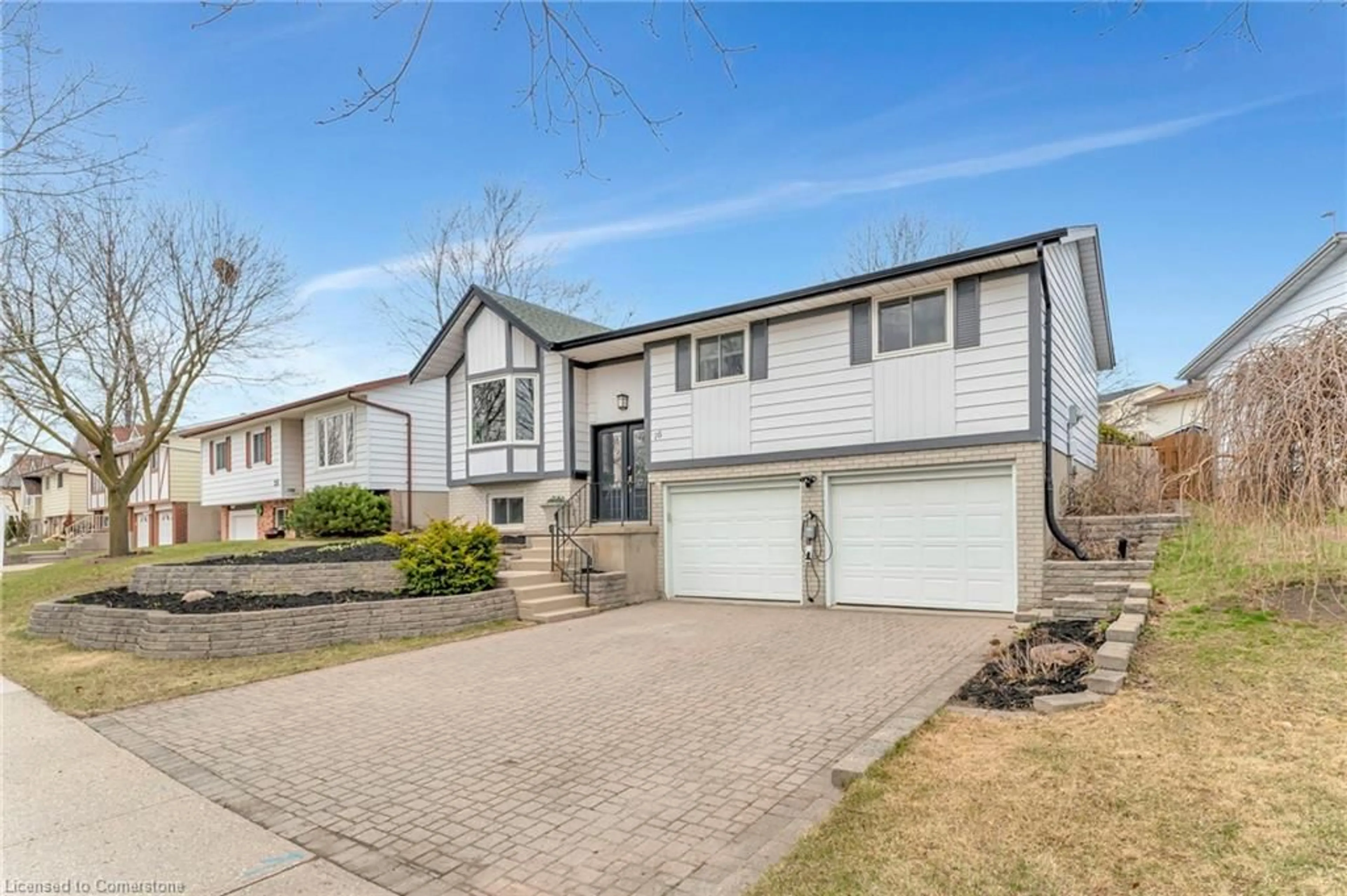 Home with vinyl exterior material, street for 16 Settlers Dr, Kitchener Ontario N2E 2L3