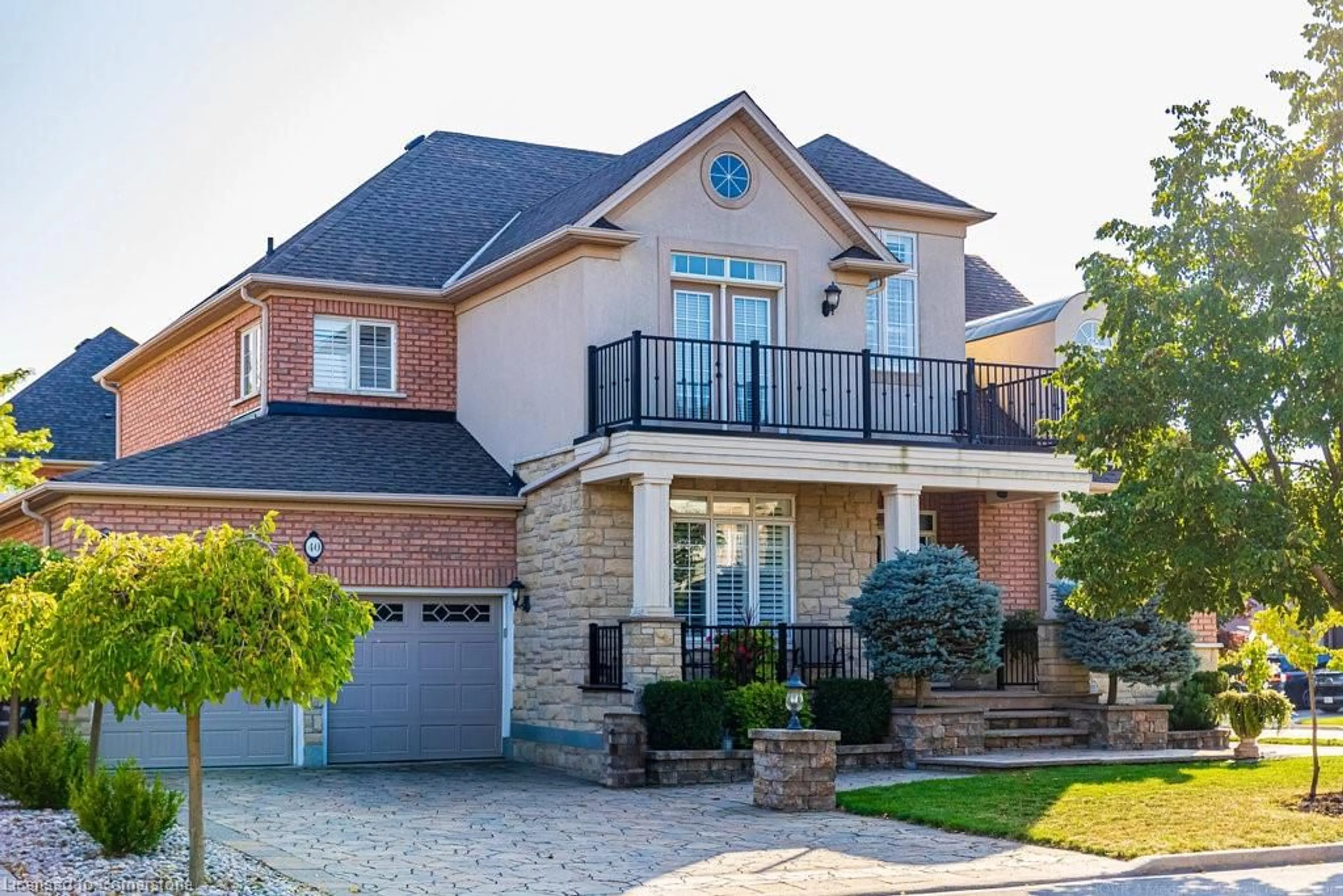 Home with brick exterior material, street for 40 Delrosa Way, Stoney Creek Ontario L8E 6E5