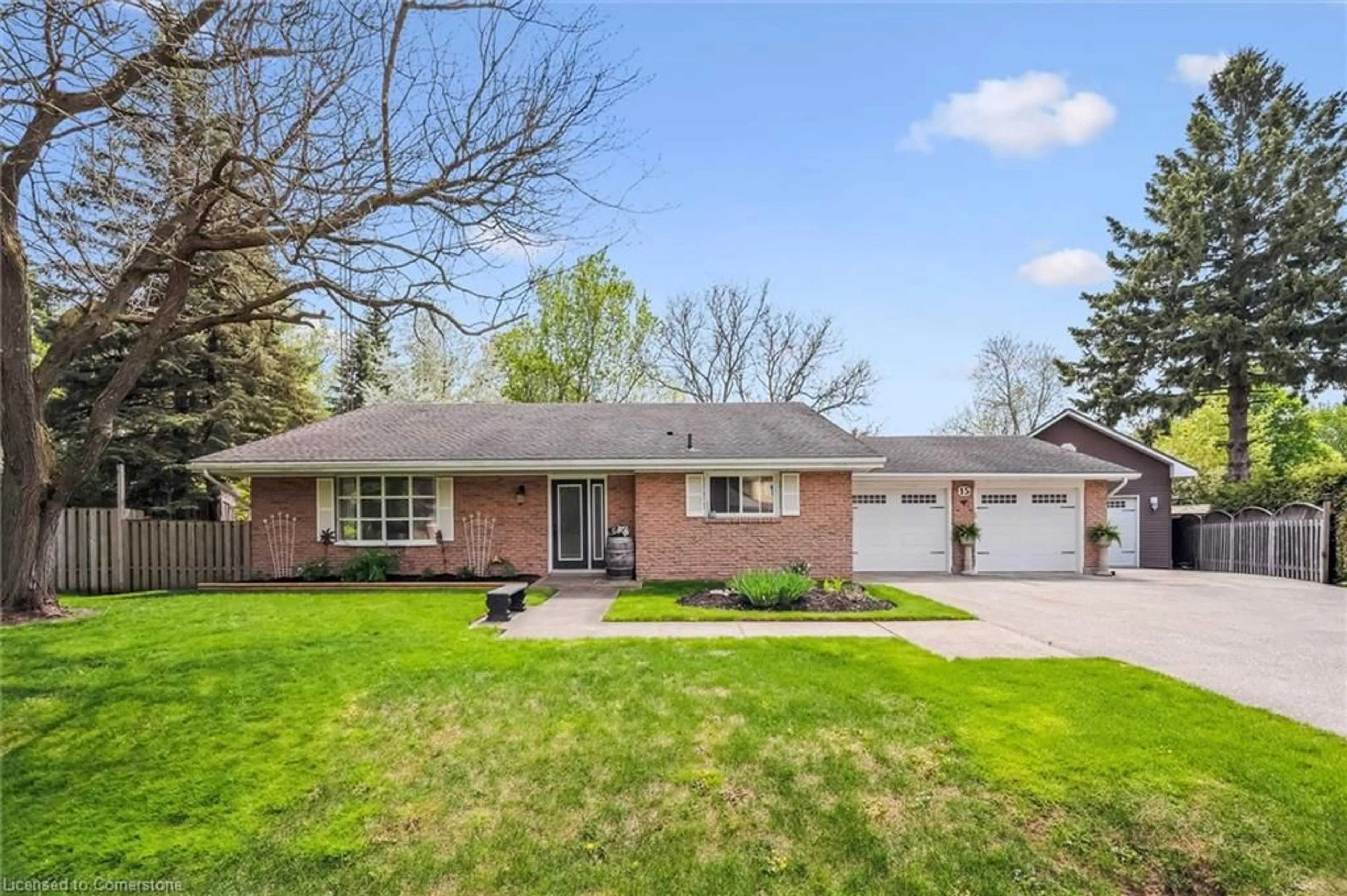 Home with brick exterior material, street for 15 Wellington Dr, Elora Ontario N0B 1S0