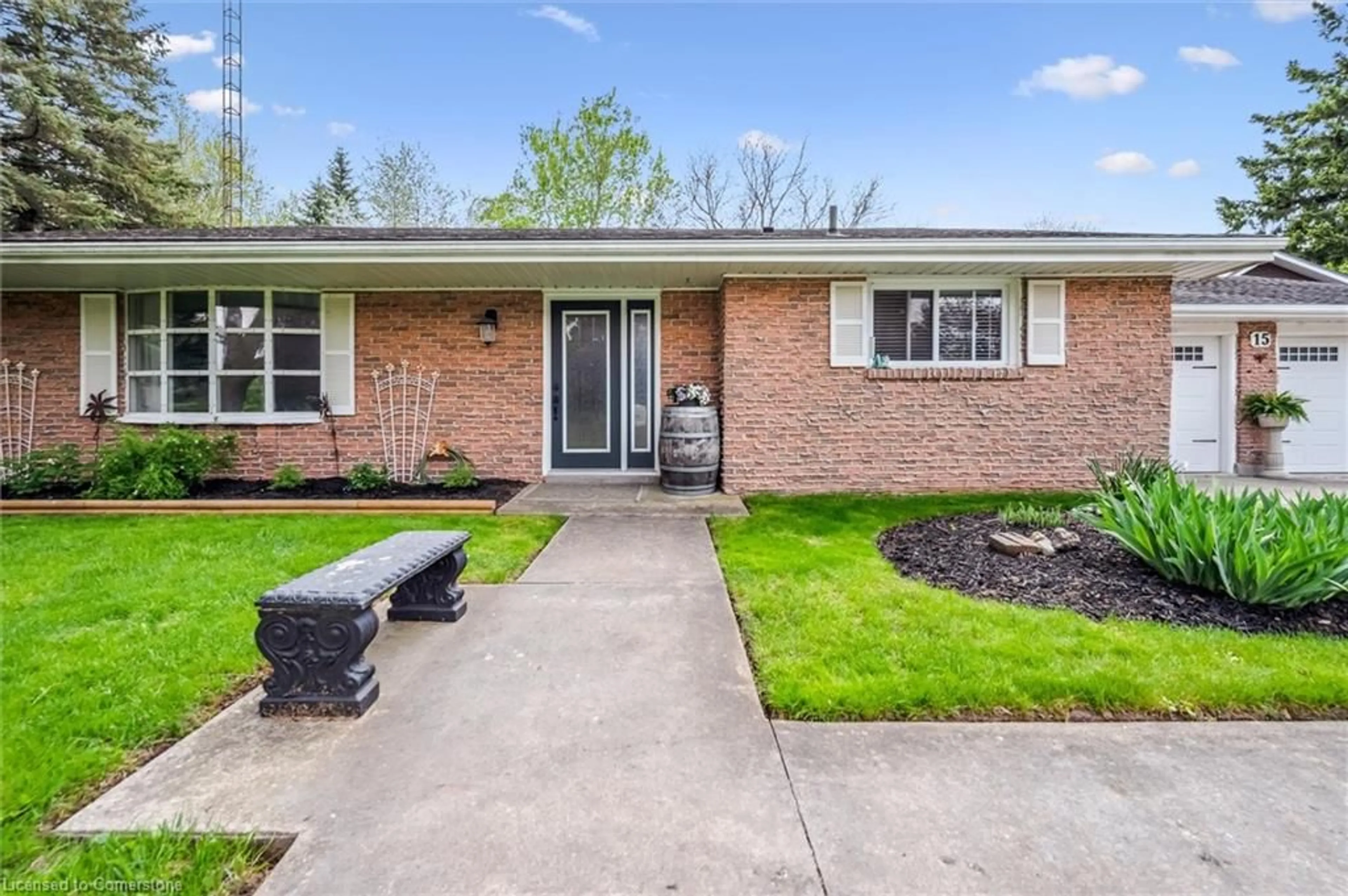Home with brick exterior material, street for 15 Wellington Dr, Elora Ontario N0B 1S0