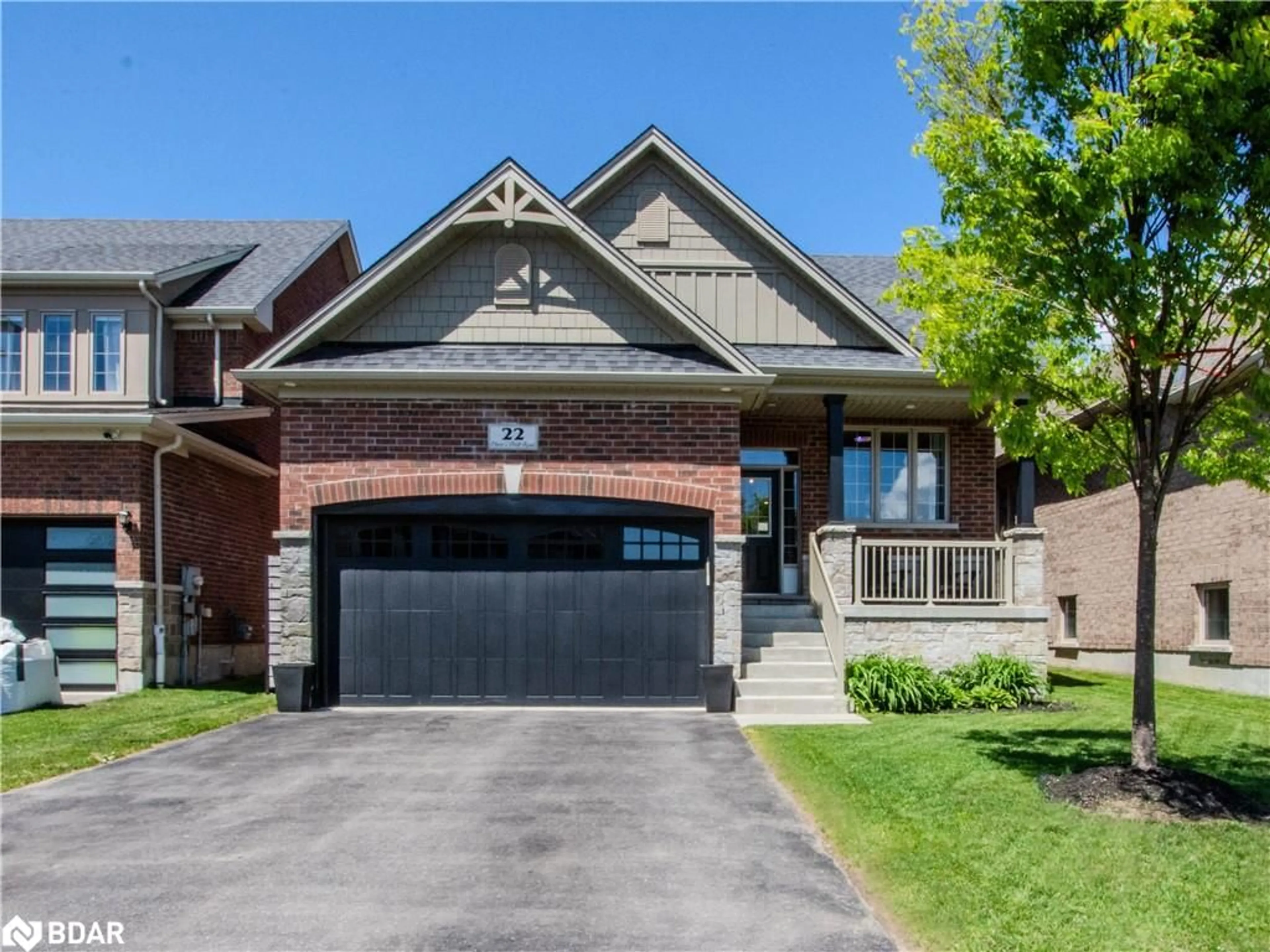 Home with brick exterior material, street for 22 Oliver's Mill Road Rd, Springwater Ontario L9X 0S8