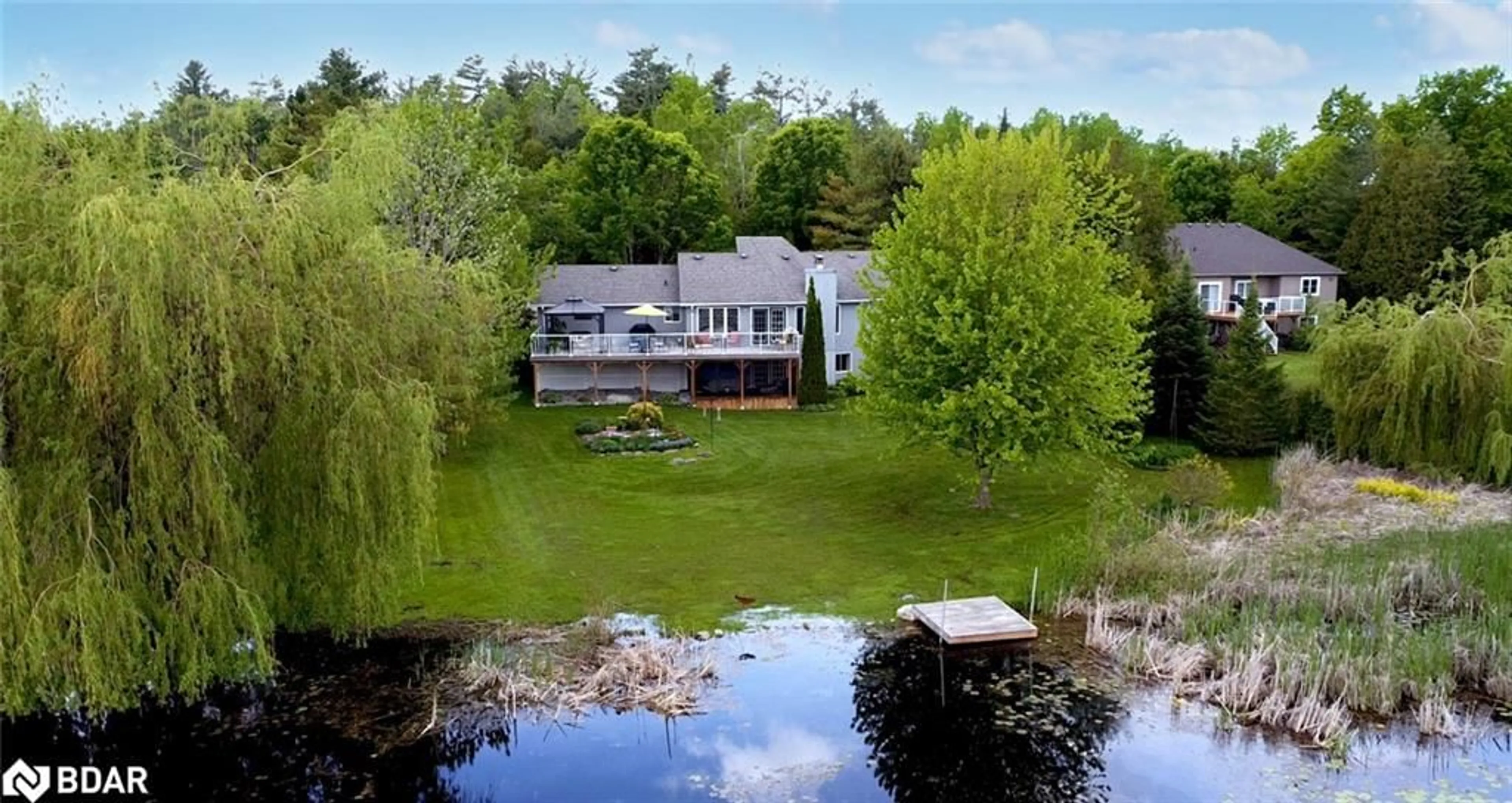 A pic from outside/outdoor area/front of a property/back of a property/a pic from drone, water/lake/river/ocean view for 86 Aino Beach Rd, Mariposa Ontario K0M 2C0