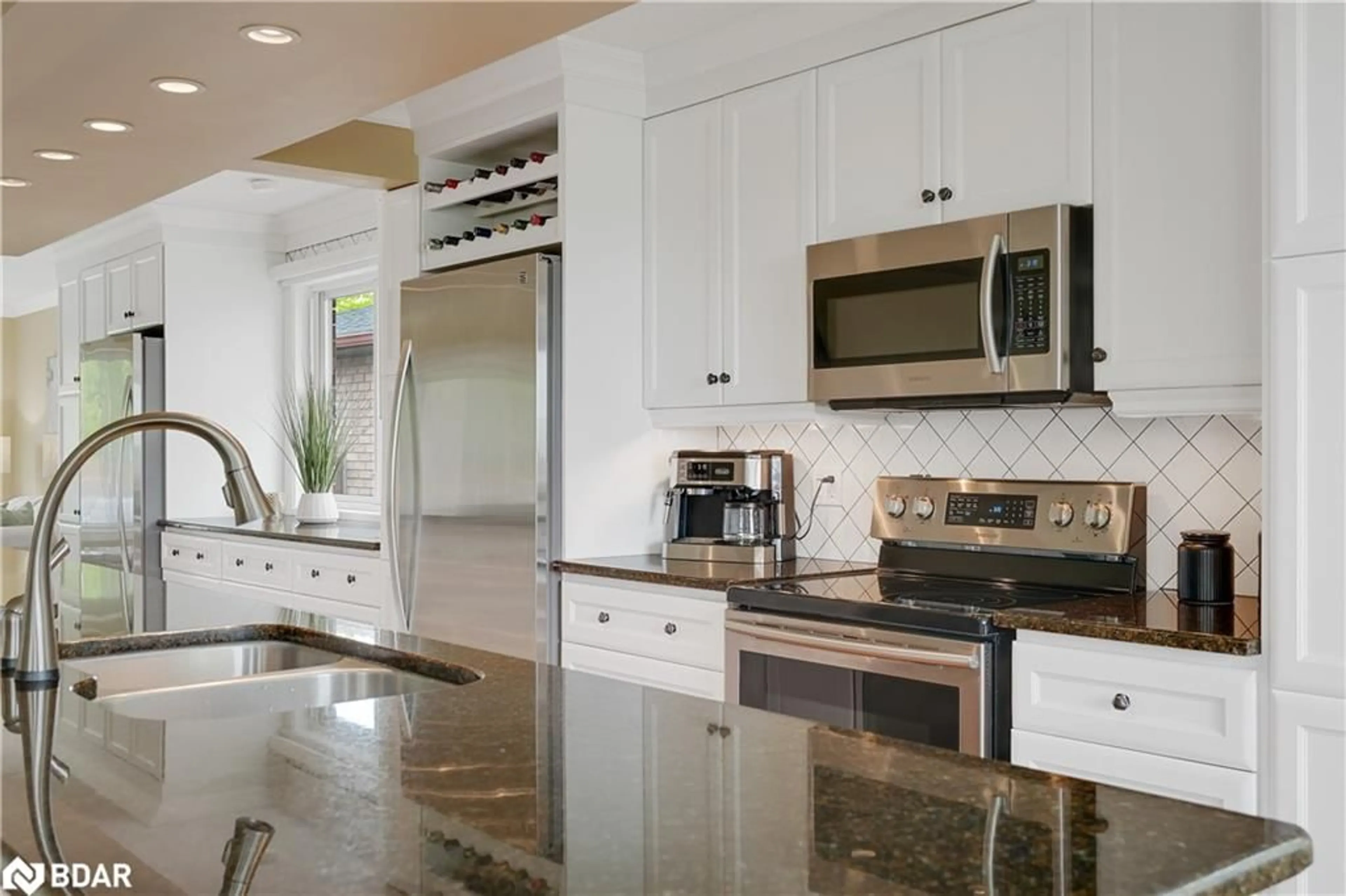 Contemporary kitchen, ceramic/tile floor for 135 Fox Run, Barrie Ontario L4N 6C9