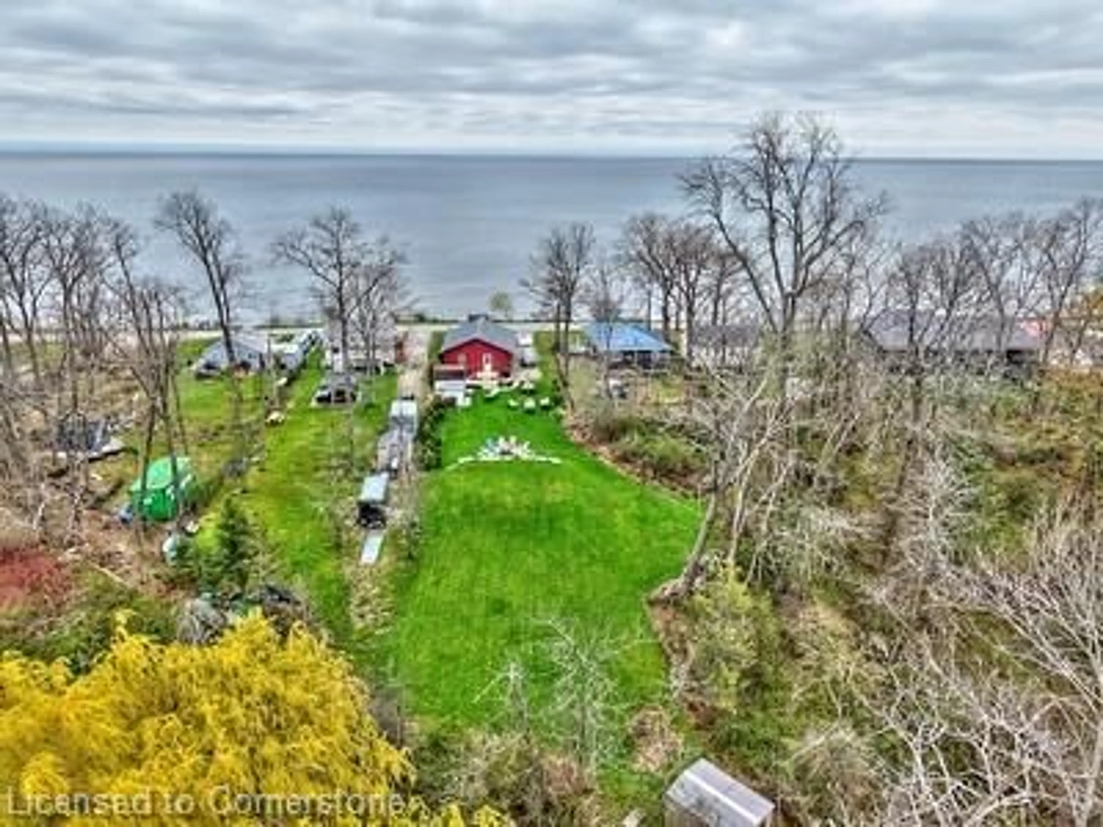 A pic from outside/outdoor area/front of a property/back of a property/a pic from drone, water/lake/river/ocean view for 2401 Lakeshore Rd, Haldimand County Ontario N1A 2W8