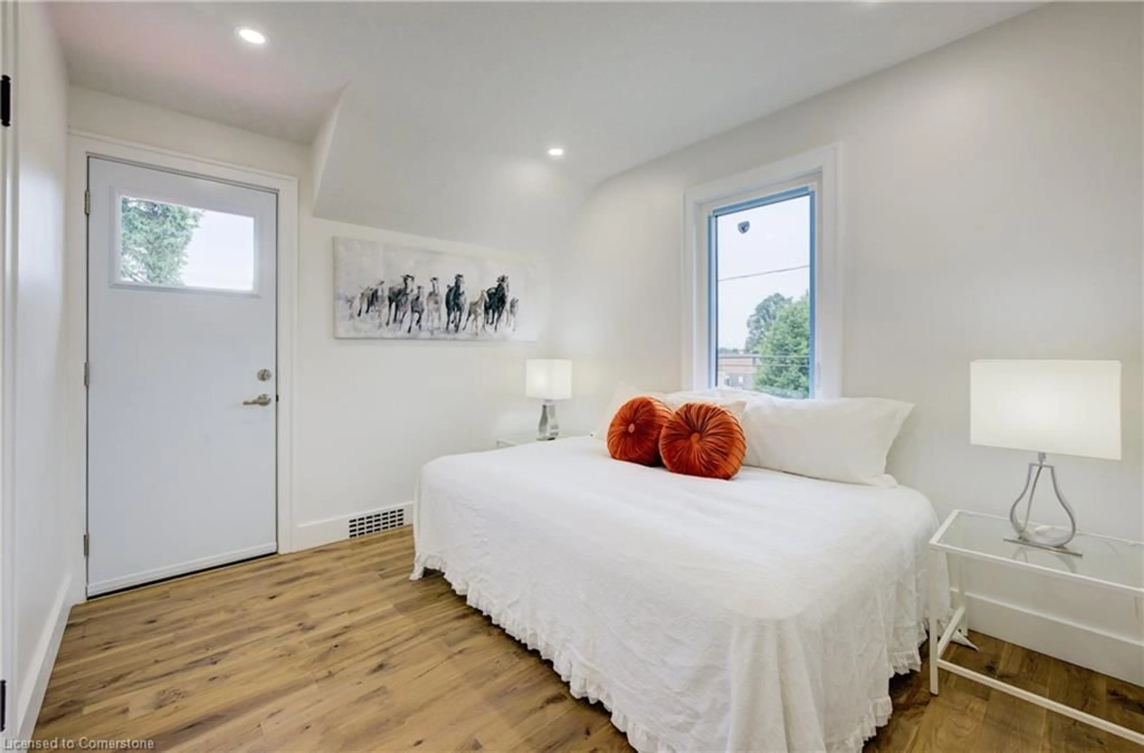 Bedroom with bed, wood/laminate floor for 268 Cameron St, Kitchener Ontario N2H 3B5