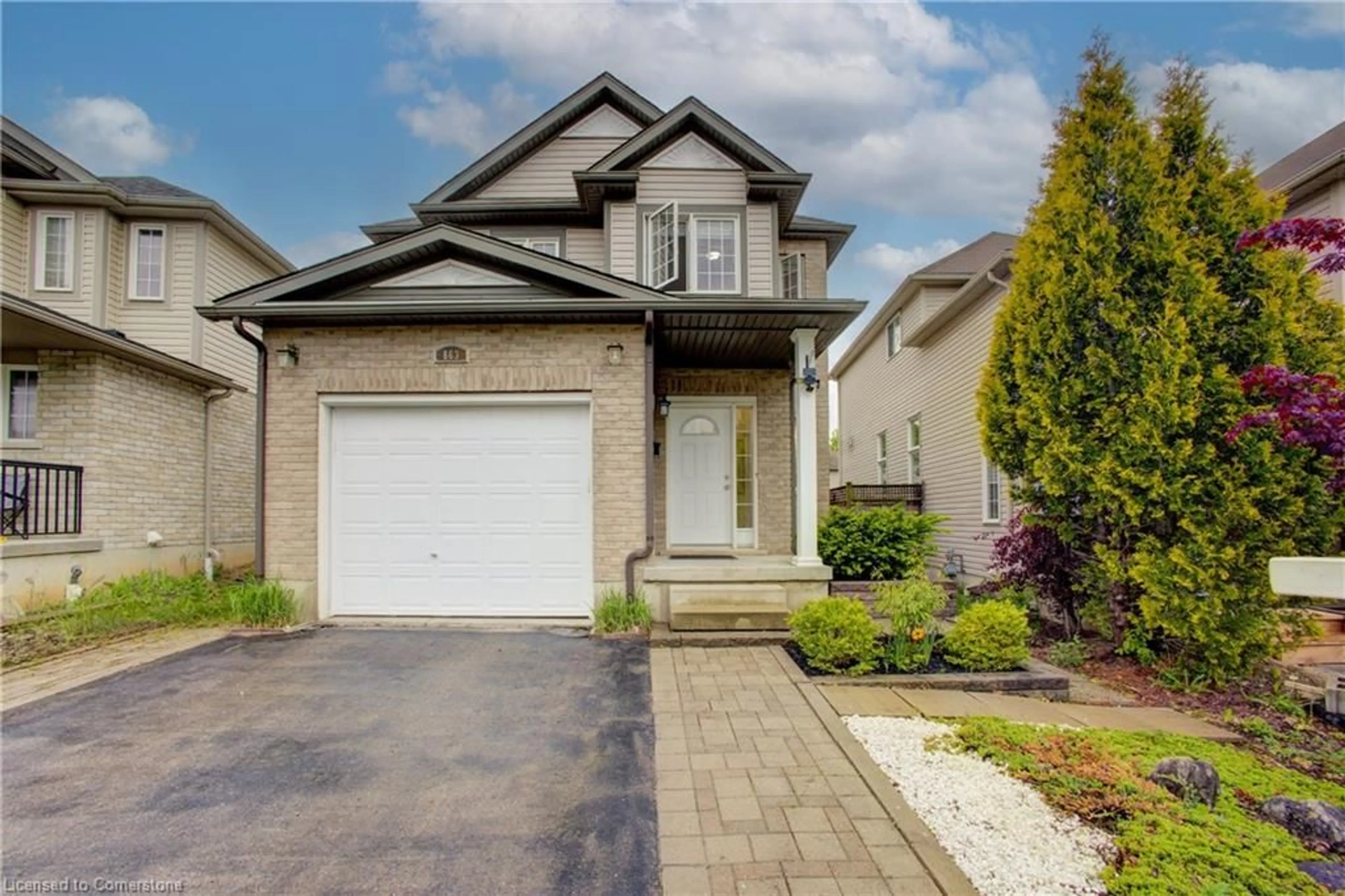 Home with brick exterior material, street for 863 Laurelwood Dr, Waterloo Ontario N2V 2X8