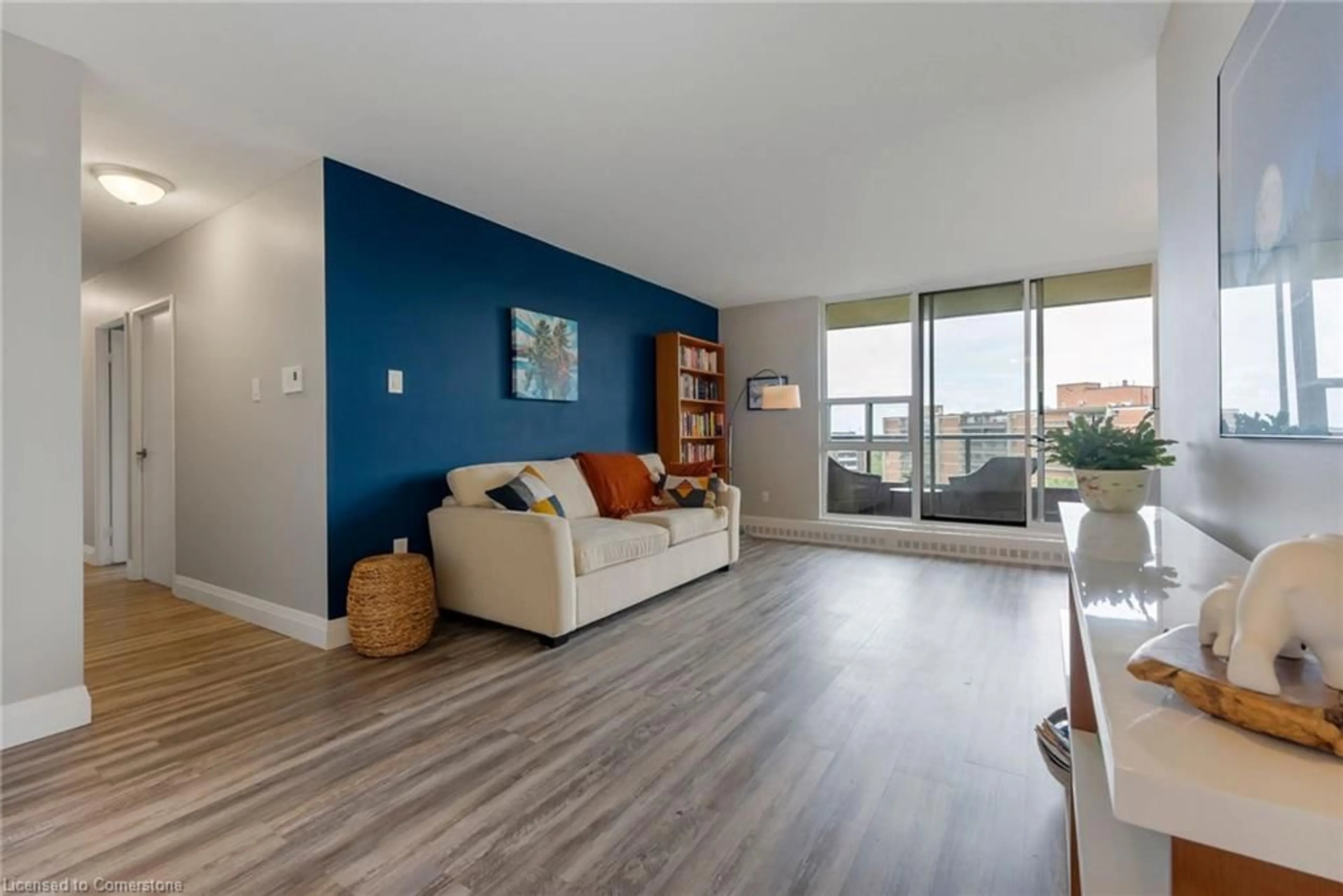 Living room with furniture, wood/laminate floor for 1966 Main St #1109, Hamilton Ontario L8S 1J6