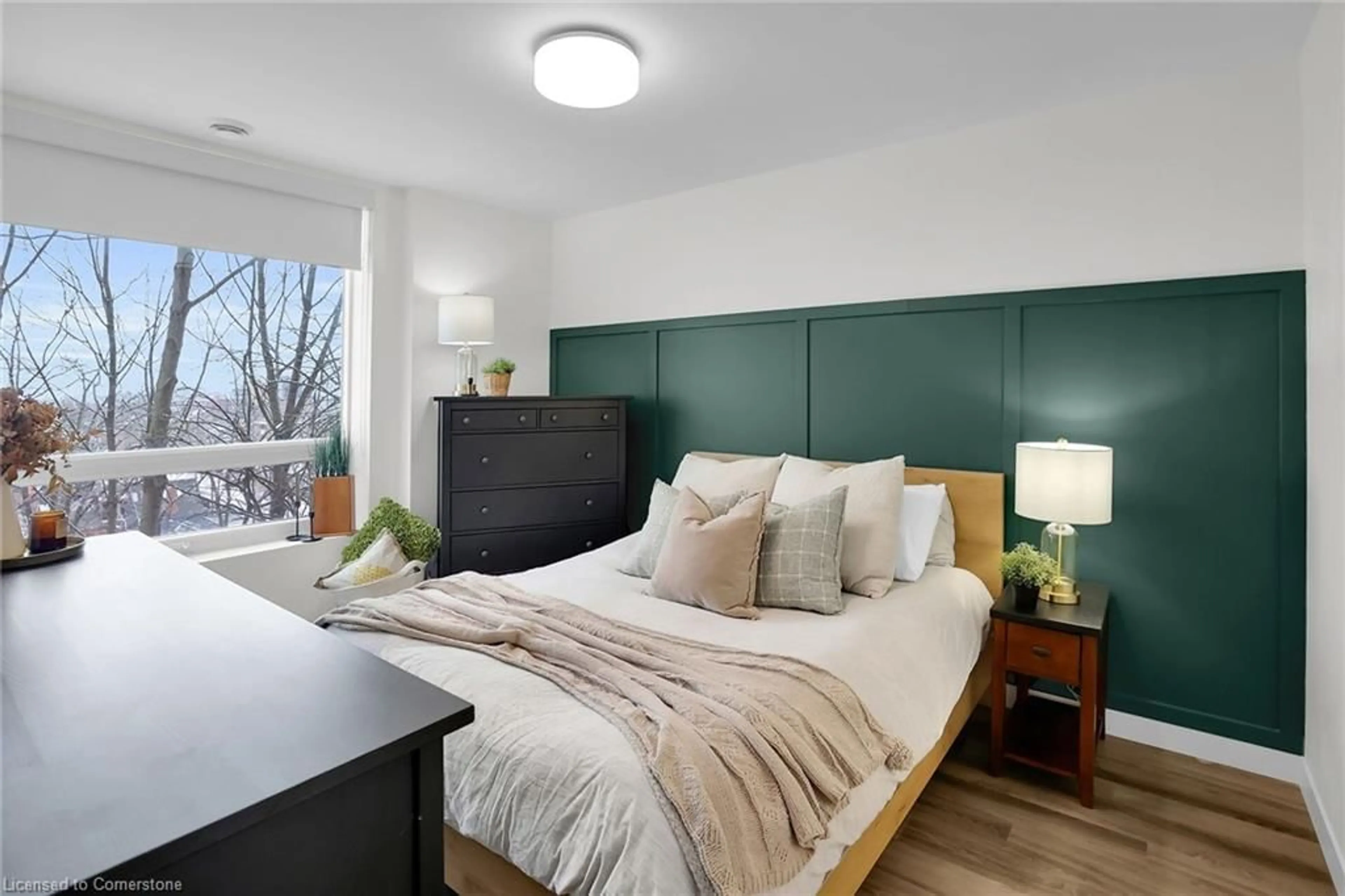 Bedroom with bed, wood/laminate floor for 479 Charlton Avenue East Ave #106, Hamilton Ontario L8N 0B4
