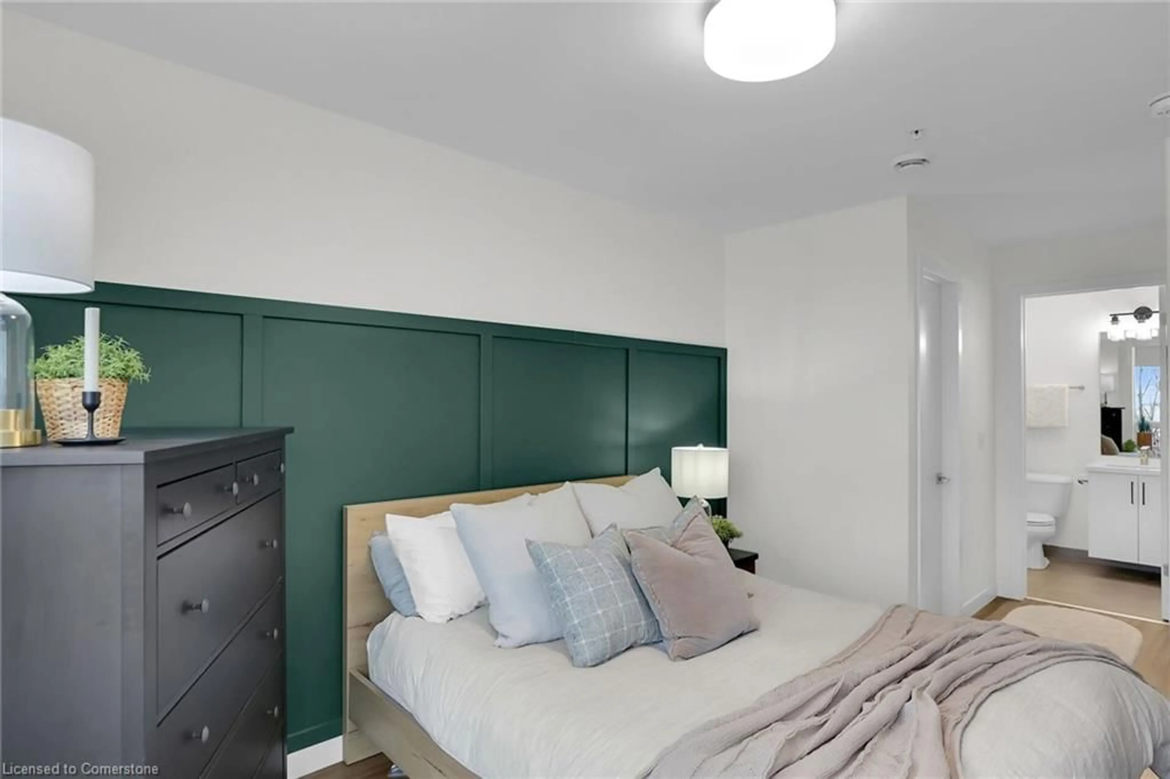 Bedroom with bed, wood/laminate floor for 479 Charlton Avenue East Ave #106, Hamilton Ontario L8N 0B4
