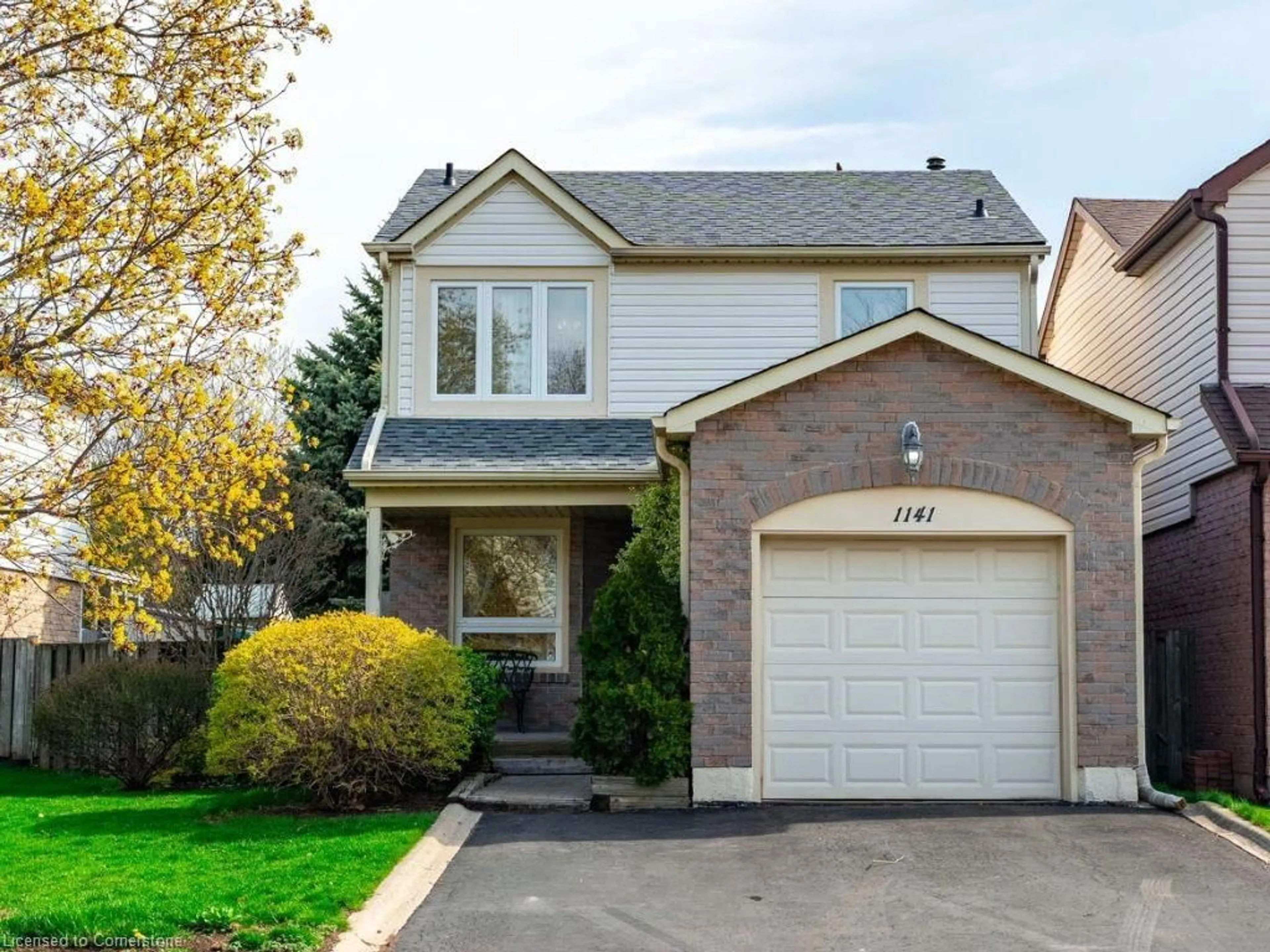 Home with vinyl exterior material, street for 1141 Montgomery Dr, Oakville Ontario L6M 1E9