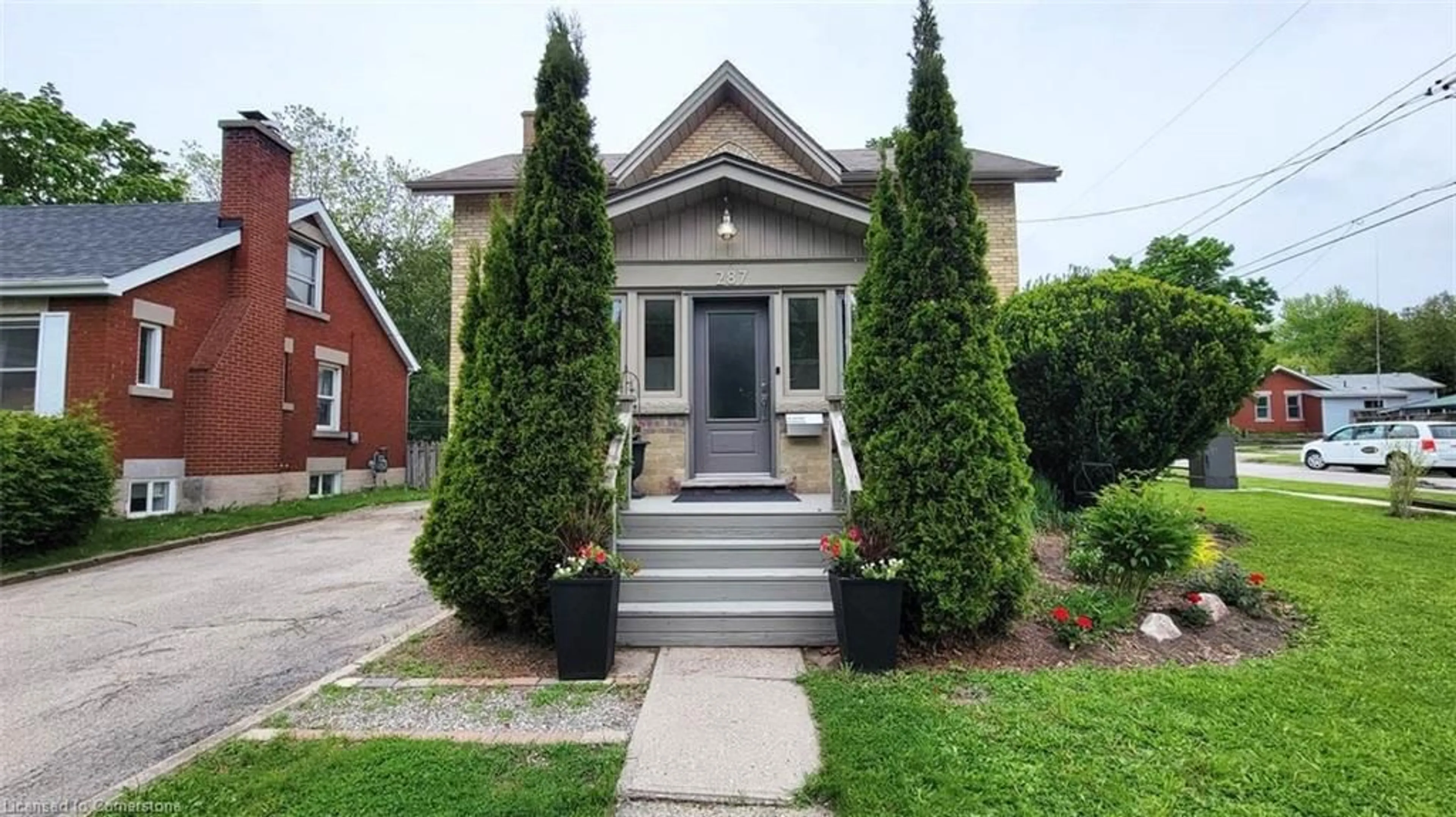 Home with brick exterior material, street for 287 Waterloo Ave, Guelph Ontario N1H 3J7