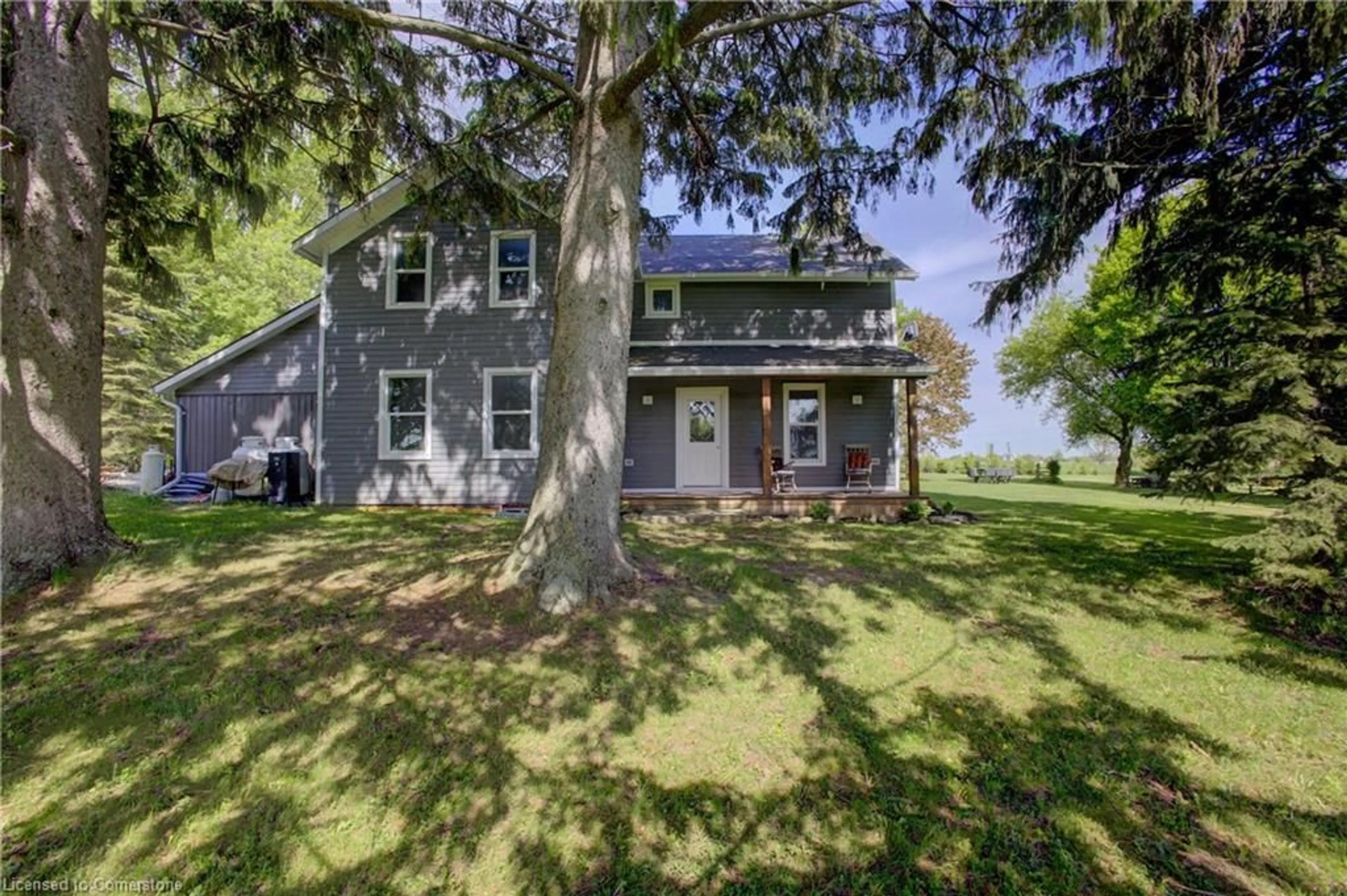 A pic from outside/outdoor area/front of a property/back of a property/a pic from drone, street for 86561 London Rd, North Huron (Twp) Ontario N0G 2W0