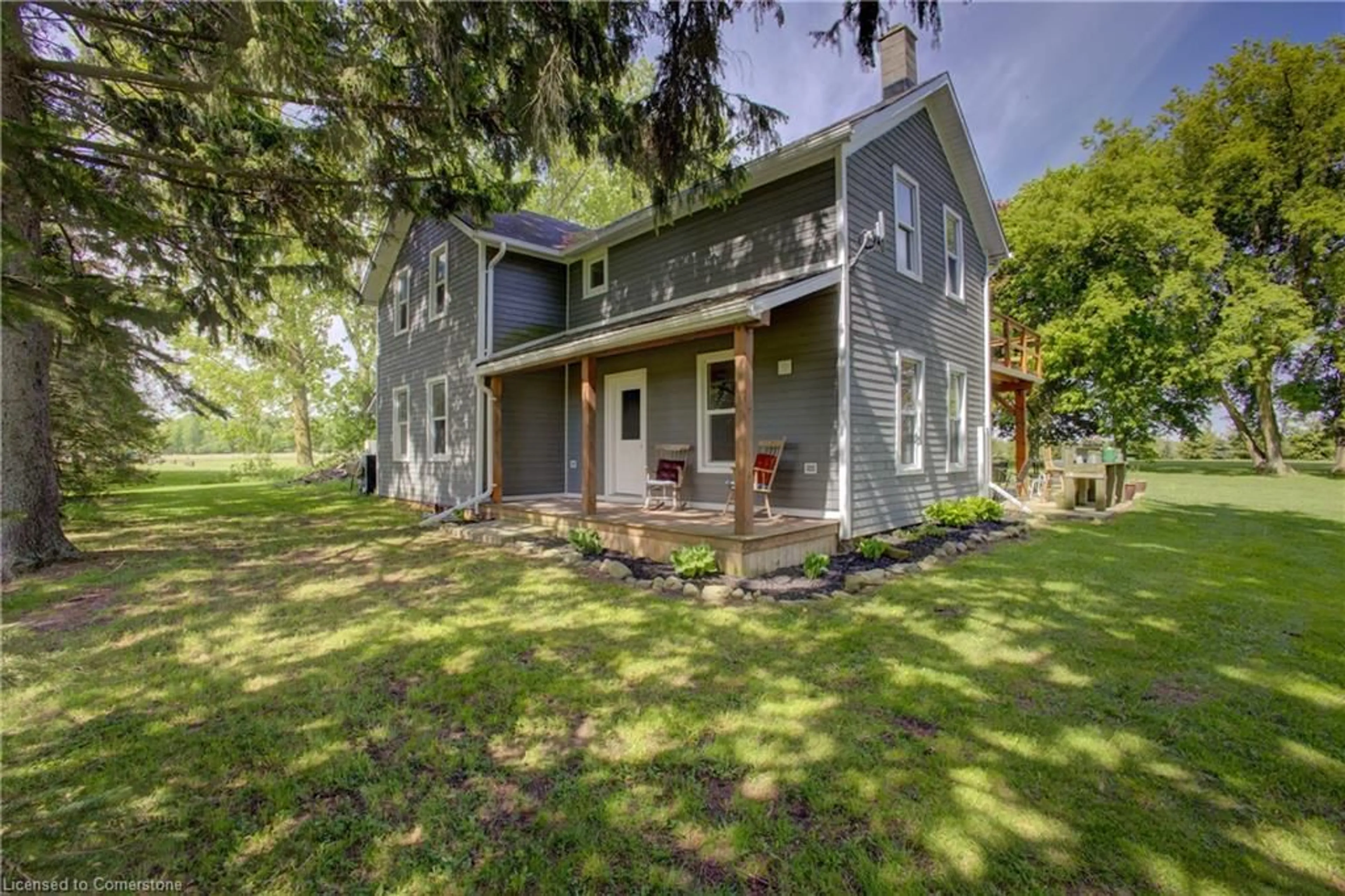 A pic from outside/outdoor area/front of a property/back of a property/a pic from drone, street for 86561 London Rd, North Huron (Twp) Ontario N0G 2W0
