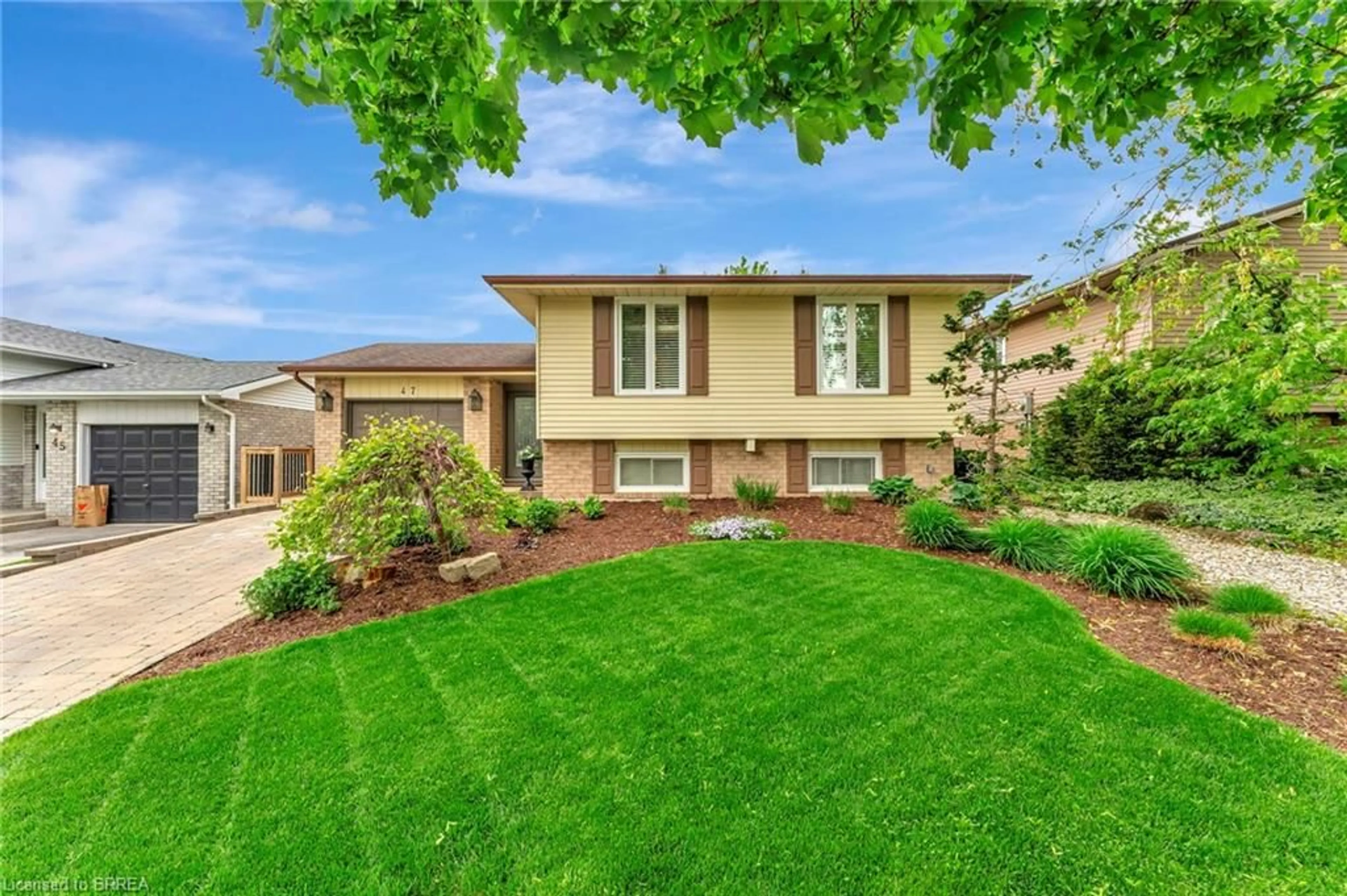 Home with vinyl exterior material, street for 47 Myrtleville Dr, Brantford Ontario N3V 1C1