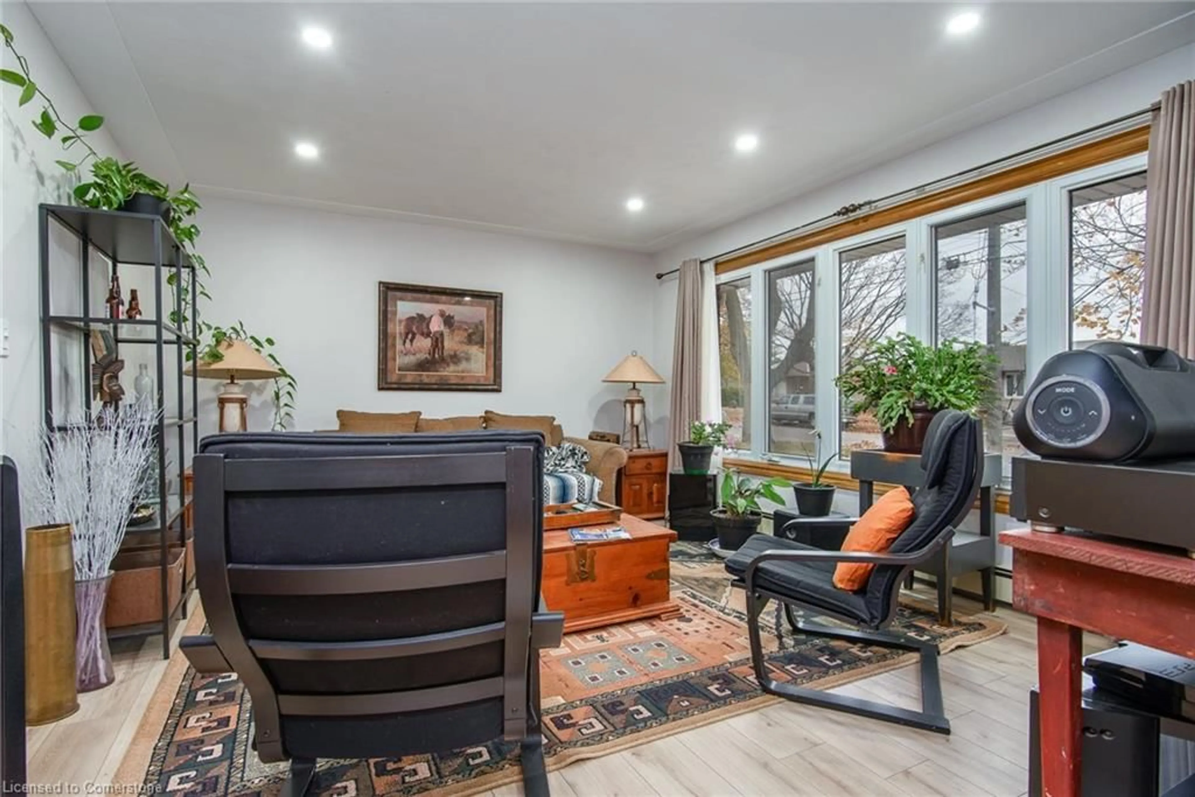 Living room with furniture, wood/laminate floor for 20 Delmar Blvd, Guelph Ontario N1E 2K8