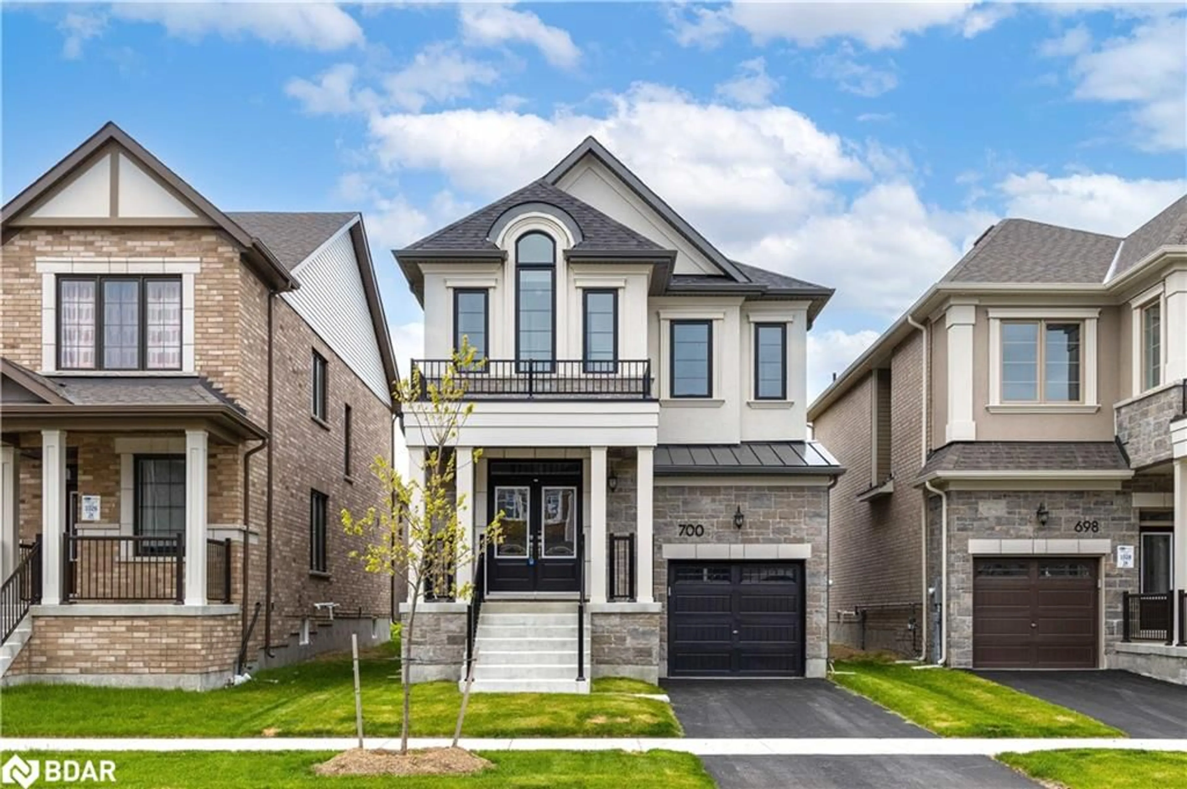 Home with brick exterior material, street for 700 Mika Street, Innisfil Ontario L9S 0R7